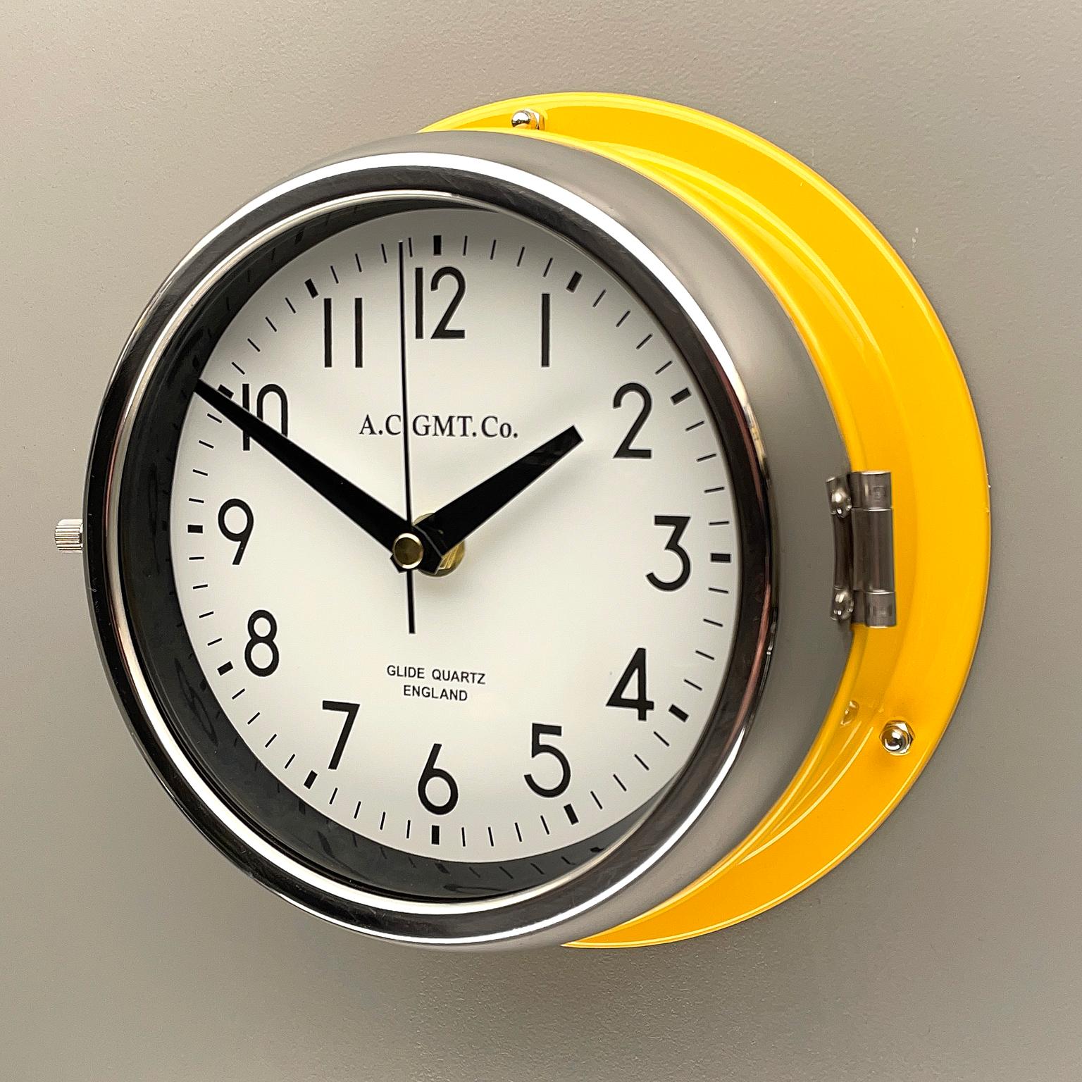 Steel 1970's British Yellow Illumination & White AC GMT Co. Classic Quartz Wall Clock