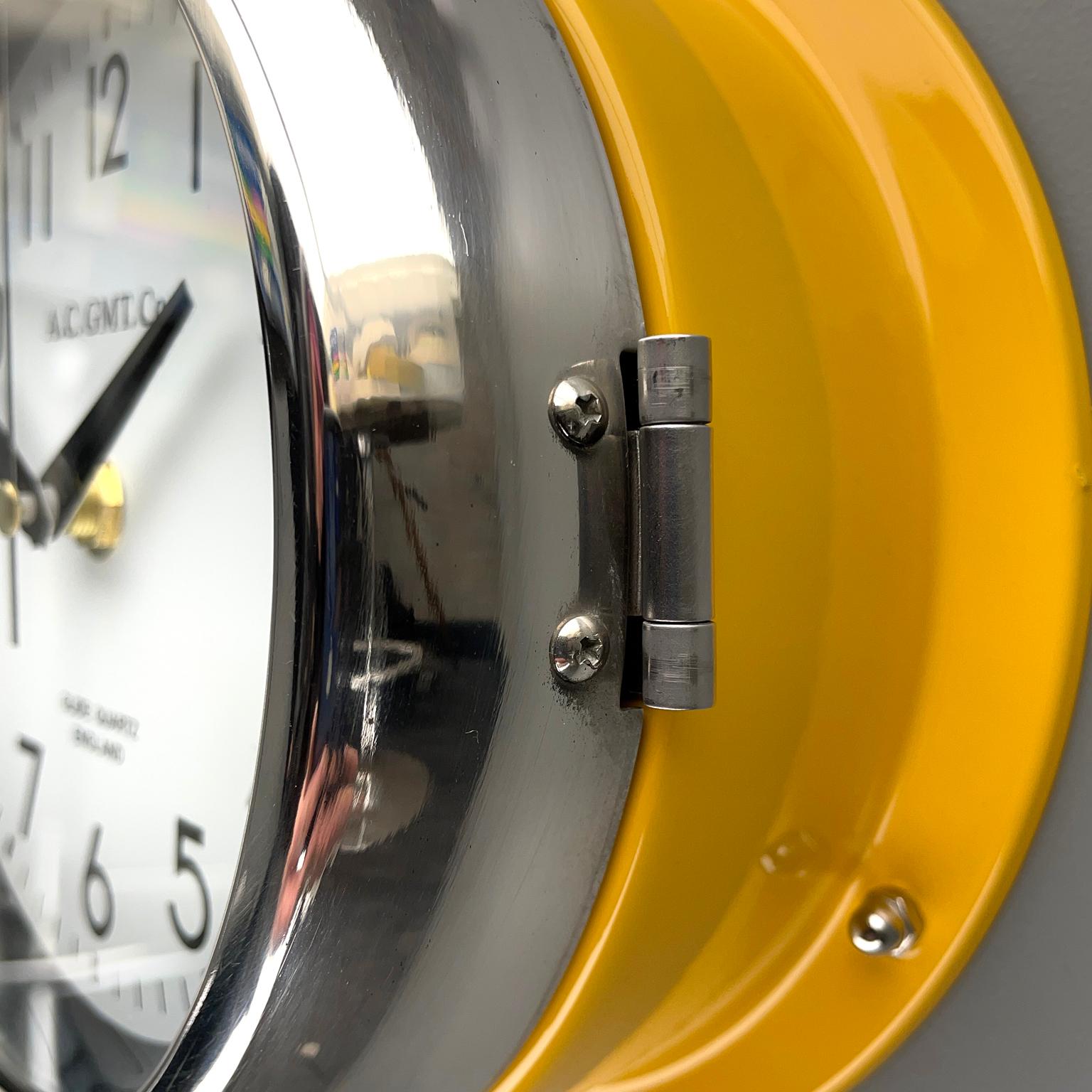 Glazed 1970's British Yellow Illumination & White AC GMT Co. Classic Quartz Wall Clock For Sale