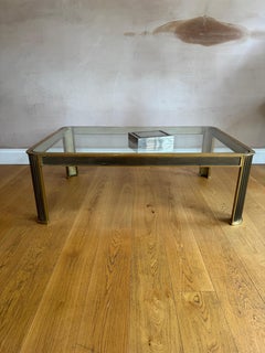 1970’s bronze and glass coffee table