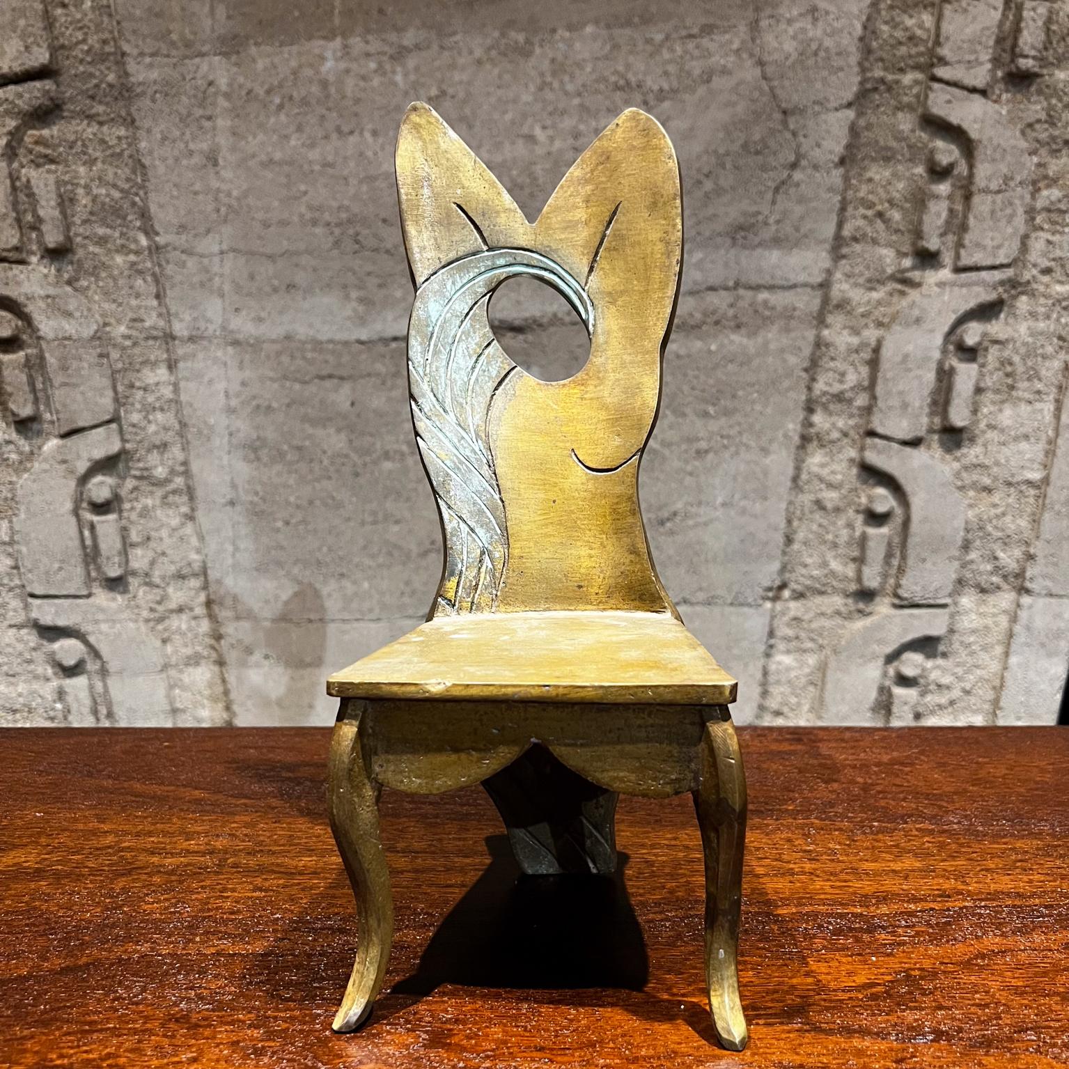 1970s Bronze Chair Sculpture Modern Surrealism Mexico
Unmarked, after Pedro Friedeberg.
12.5 tall x 5 w x 5.5 d
Original vintage condition.
Refer to all images.