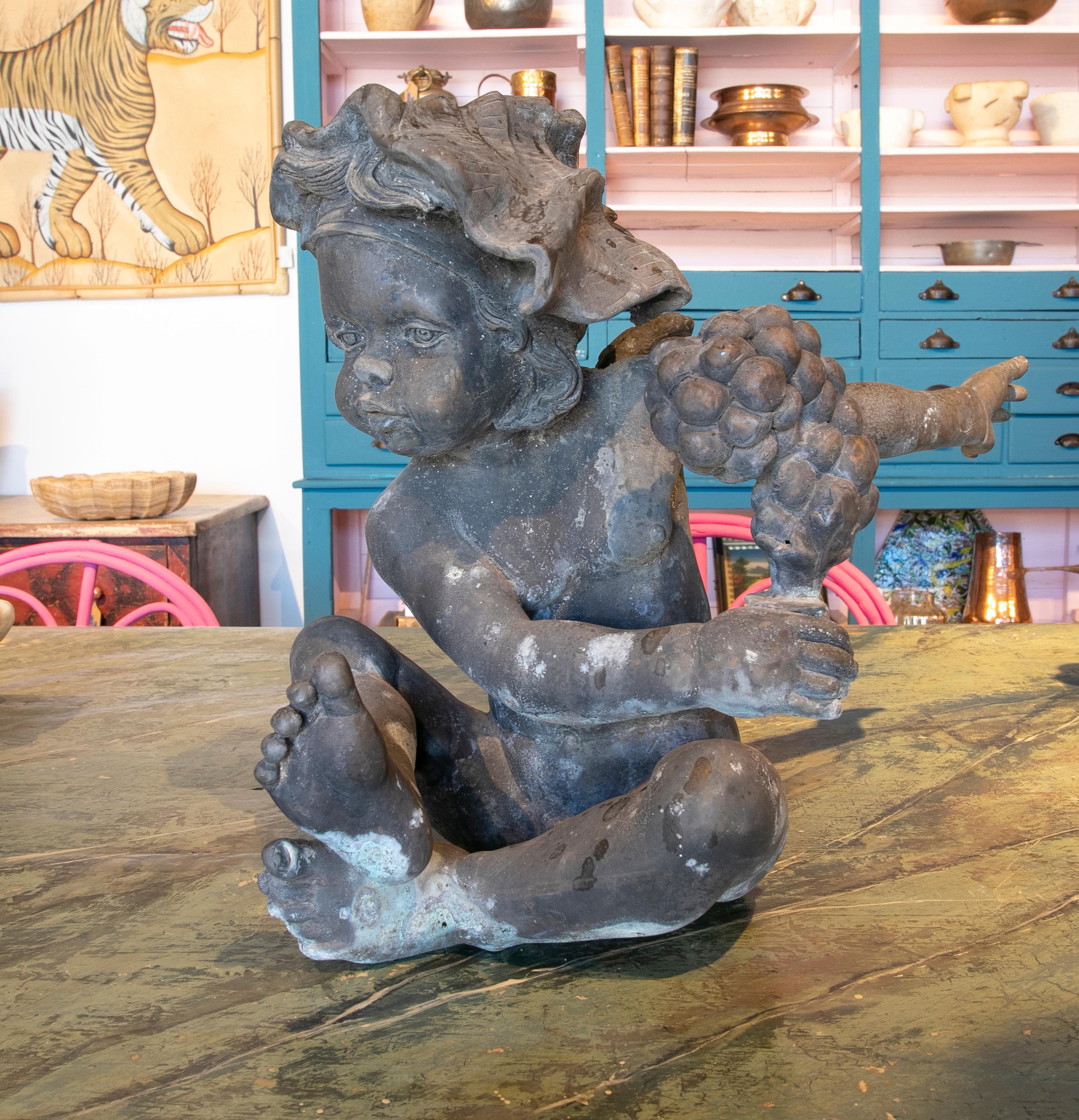 1970s Bronze French Bacchus Boy Sculpture with Wings and Grapes  In Good Condition For Sale In Marbella, ES