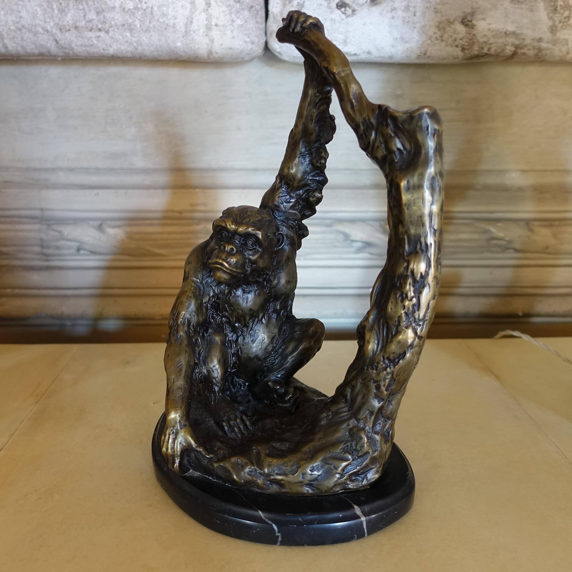 1970s monkey bronze sculpture on black marquinia marble base, perfect condition and vintage patina.