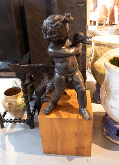 1970s Bronze Sculpture of Child with French Duck & Simple Wooden Base