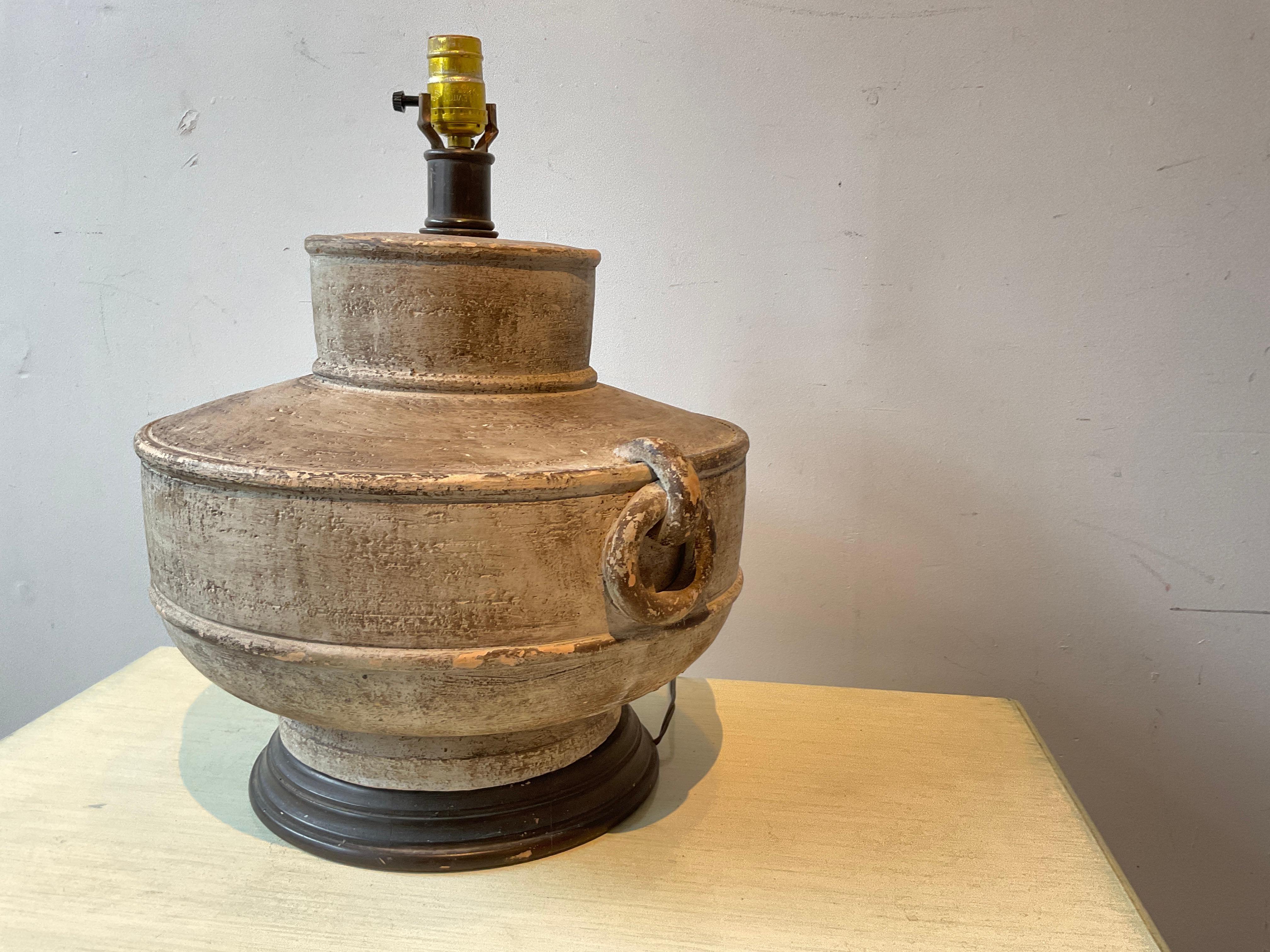 Ceramic vessel lamp on wood base . Height is to top of socket. Needs rewiring.