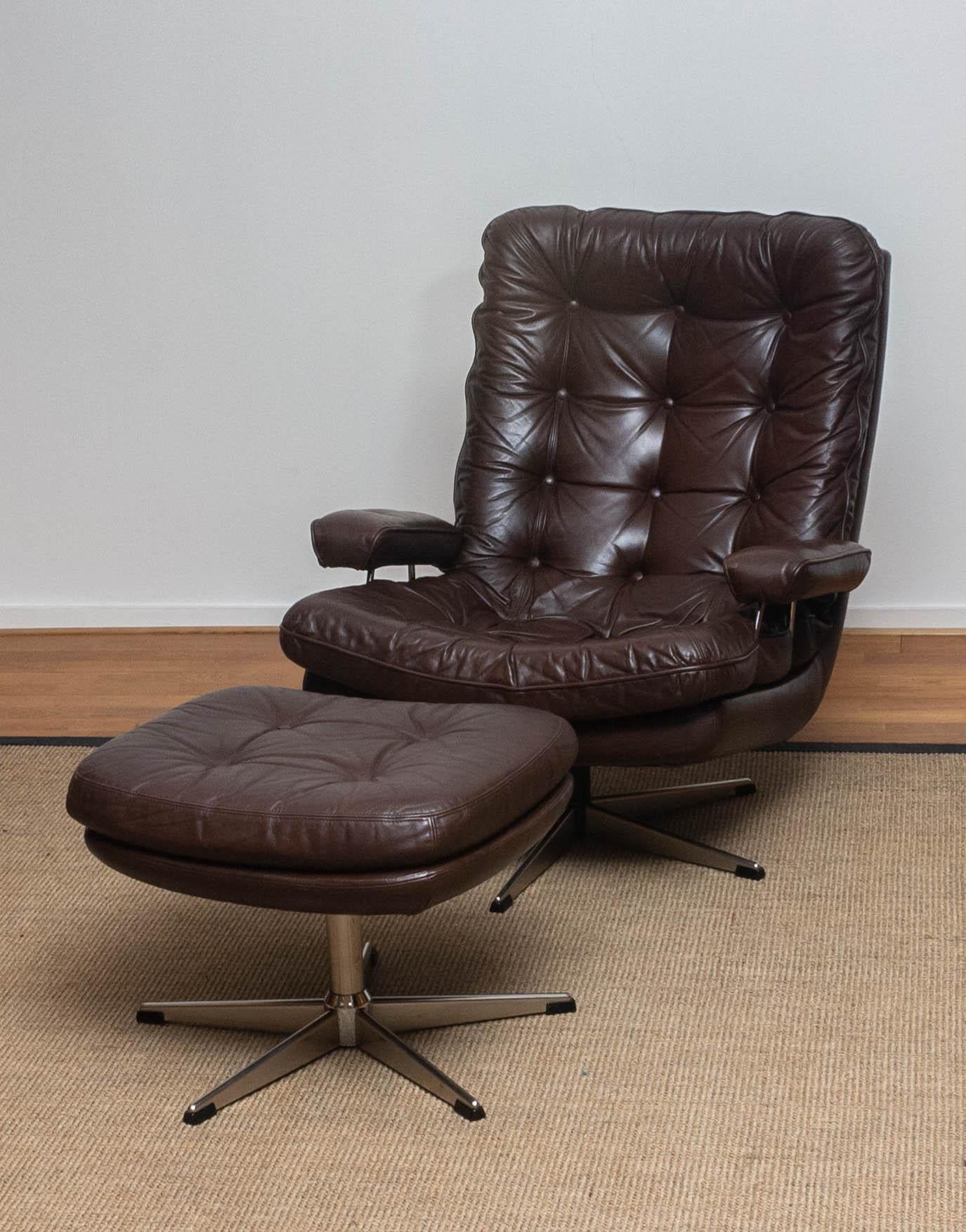 Steel 1970s, Brown Leather and Chrome Swivel Lounge Chair and Ottoman, Sweden