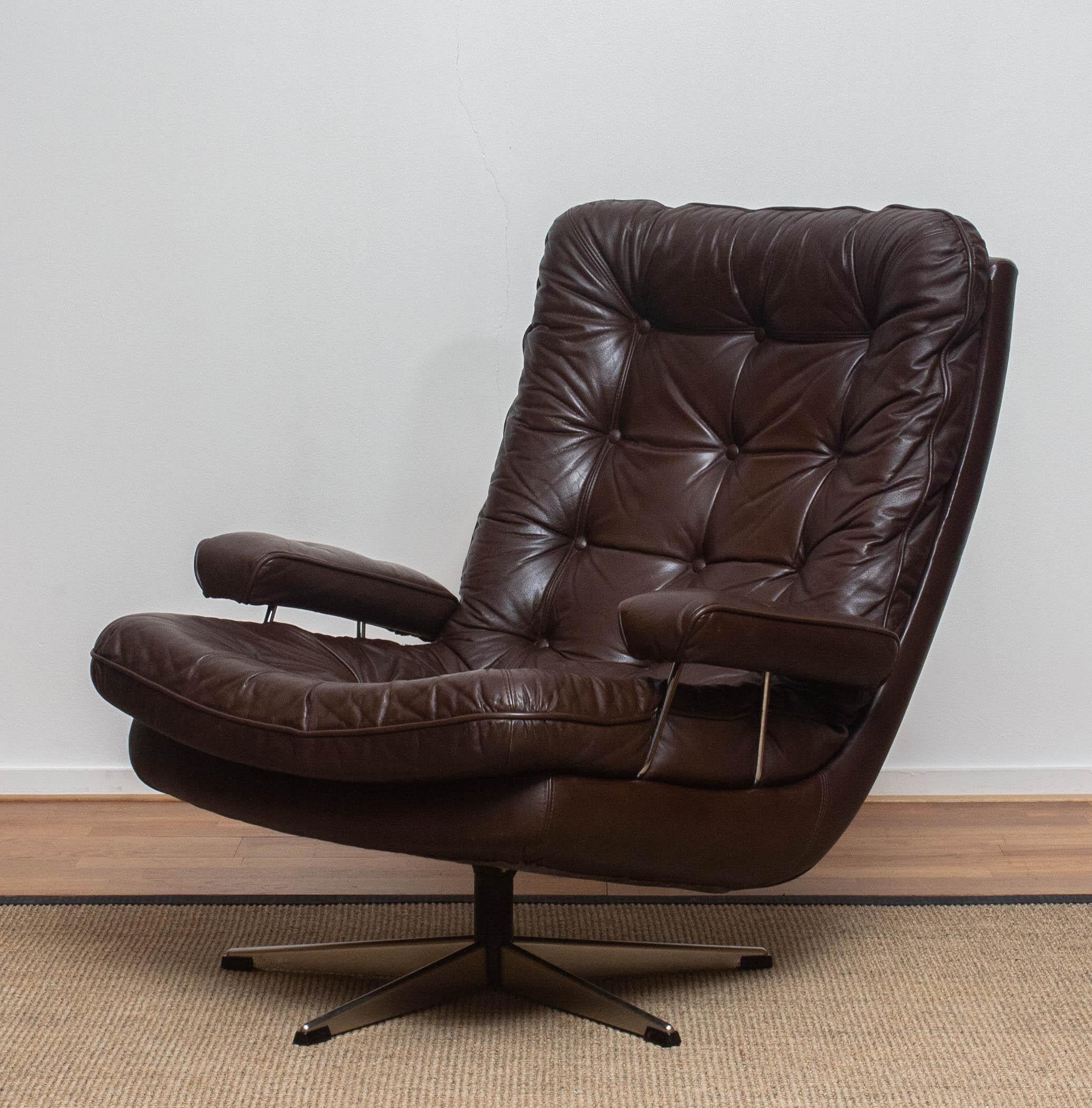 Steel 1970s, Brown Leather and Chrome Swivel Lounge Chair and Ottoman, Sweden