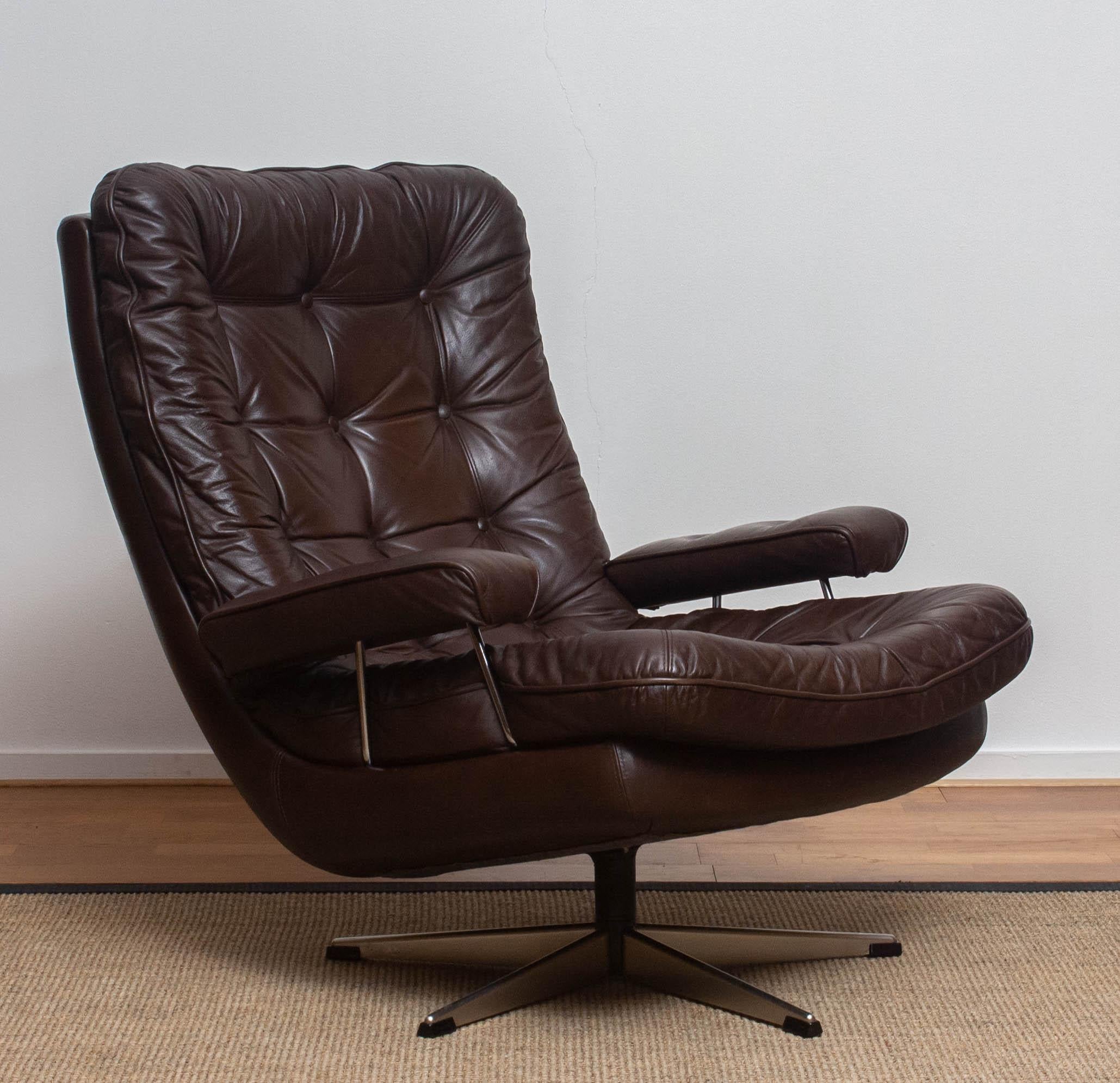 1970s, Brown Leather and Chrome Swivel Lounge Chair and Ottoman, Sweden 1