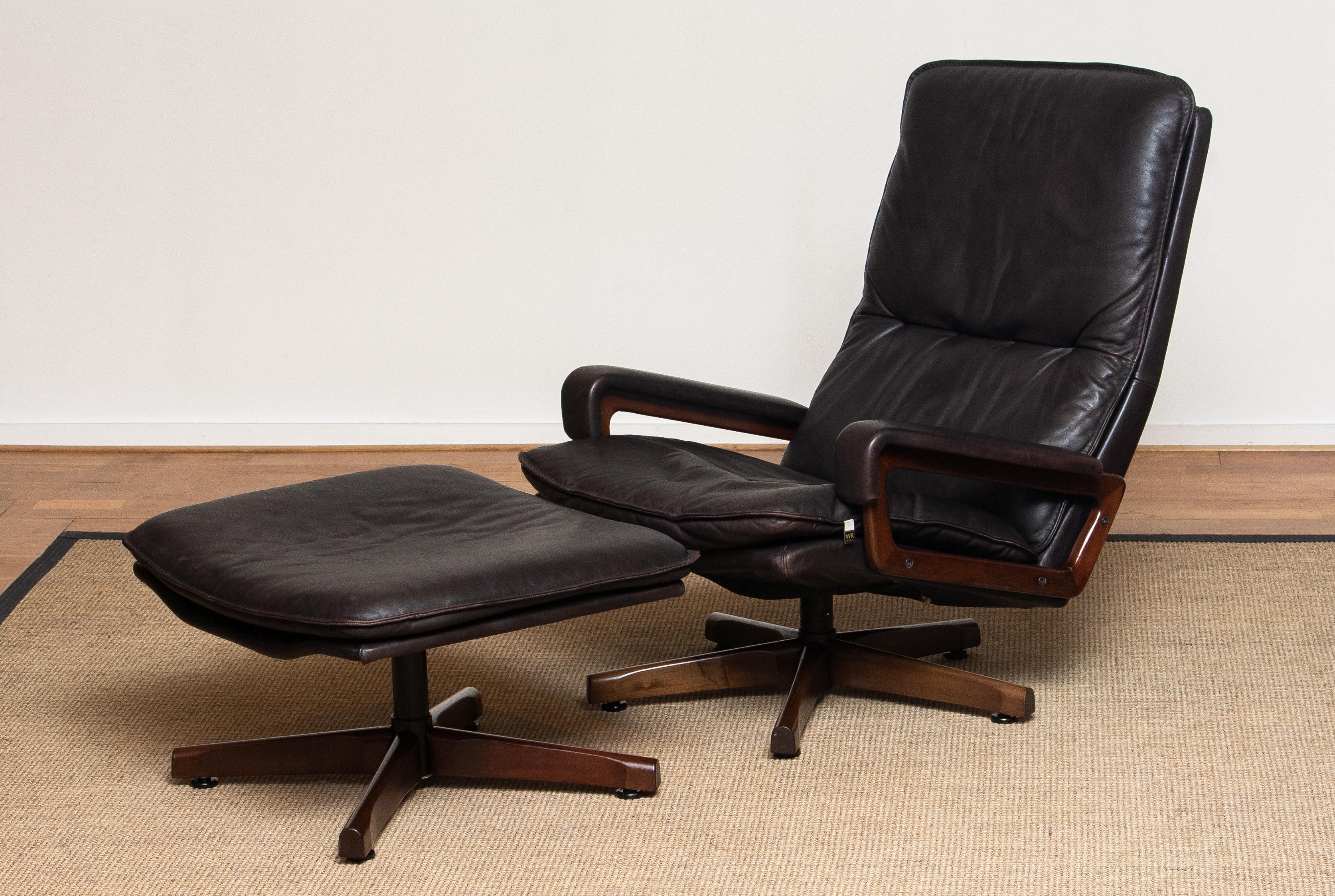 Mid-Century Modern 1970s Brown Leather Swivel Chair and Ottoman by André Vandenbeuck for WK Mobler