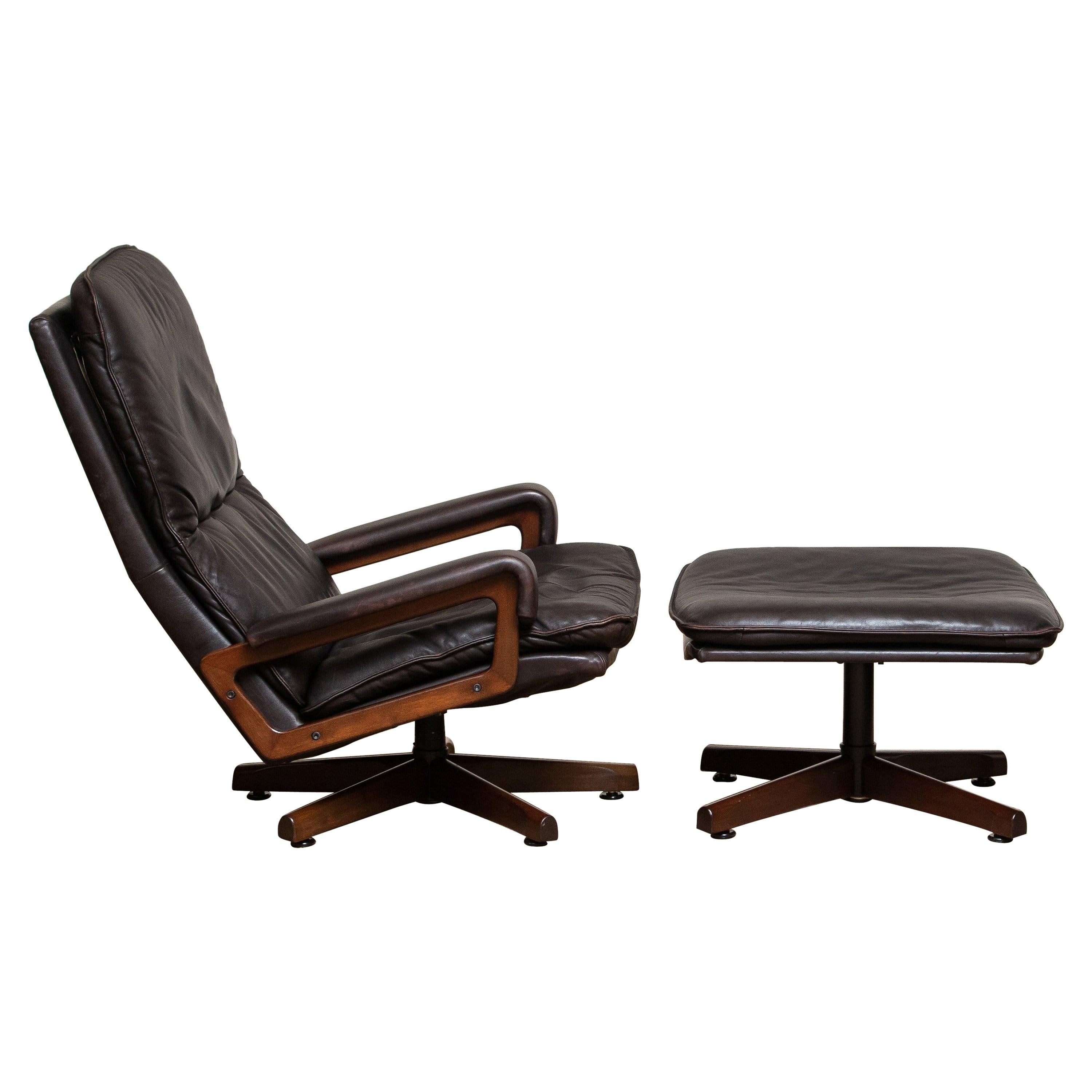 Mid-Century Modern 1970s Brown Leather Swivel Chair and Ottoman by André Vandenbeuck for WK Mobler