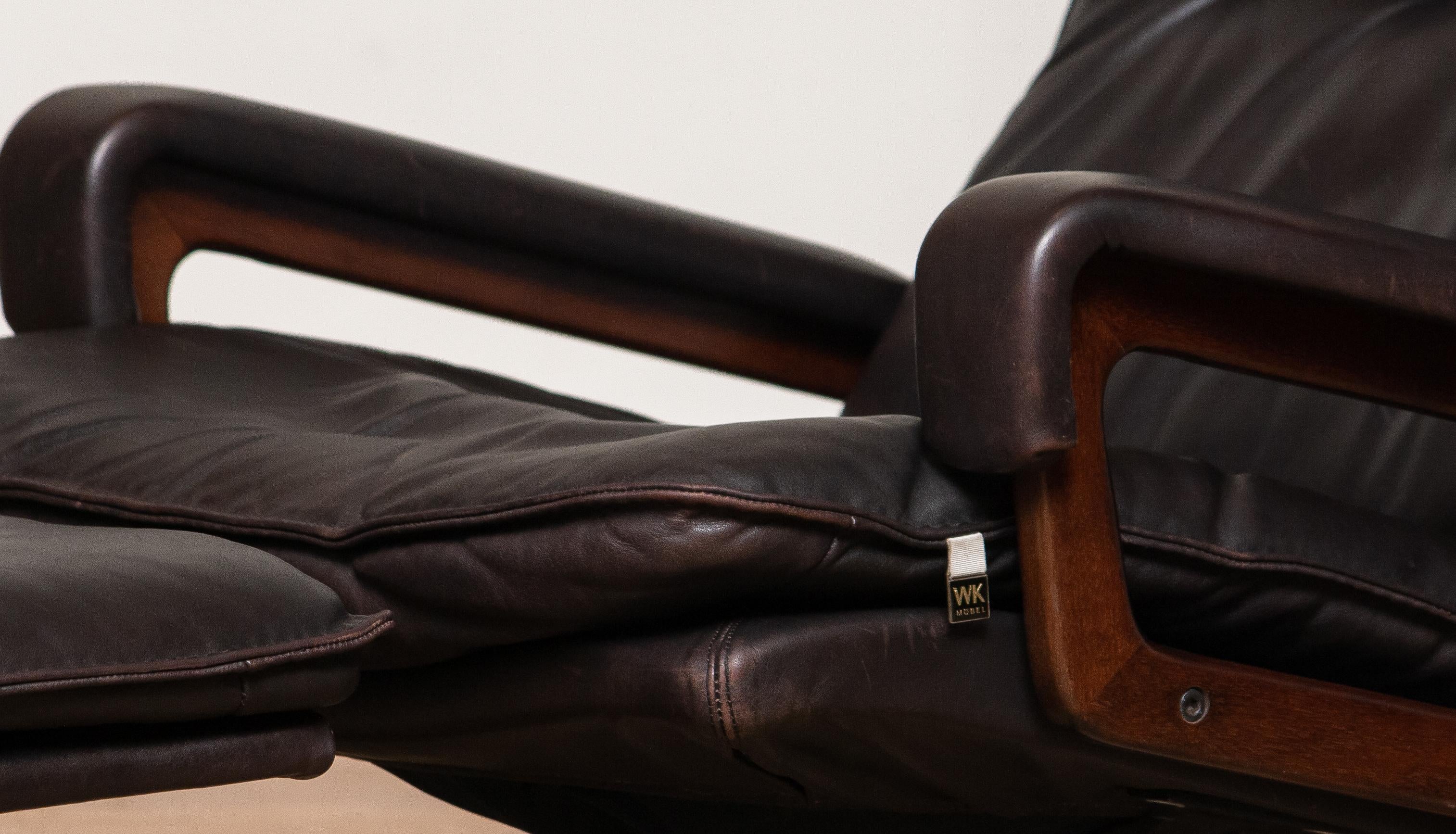 1970s Brown Leather Swivel Chair and Ottoman by André Vandenbeuck for WK Mobler In Good Condition In Silvolde, Gelderland