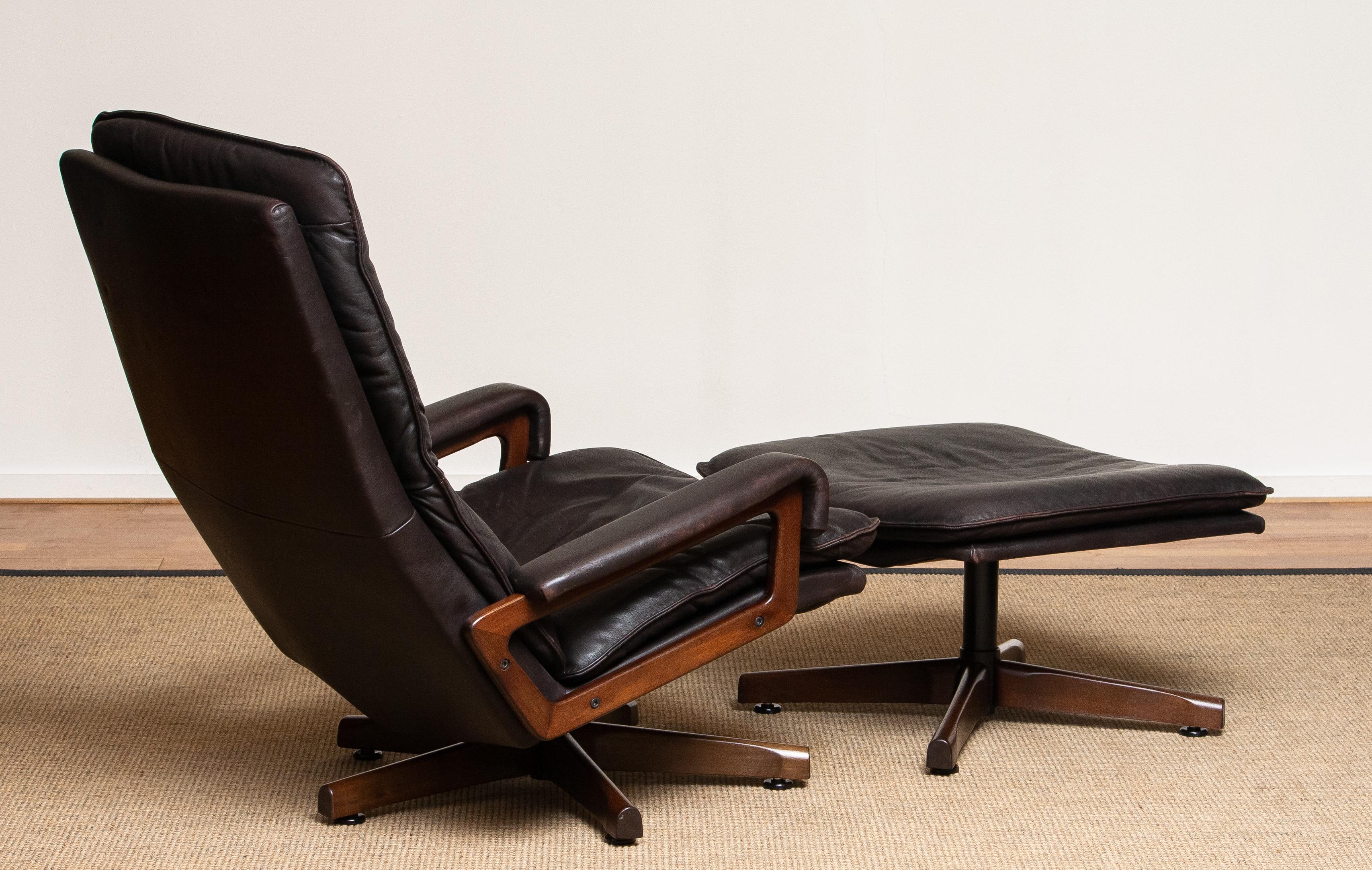 Metal 1970s Brown Leather Swivel Chair and Ottoman by André Vandenbeuck for WK Mobler