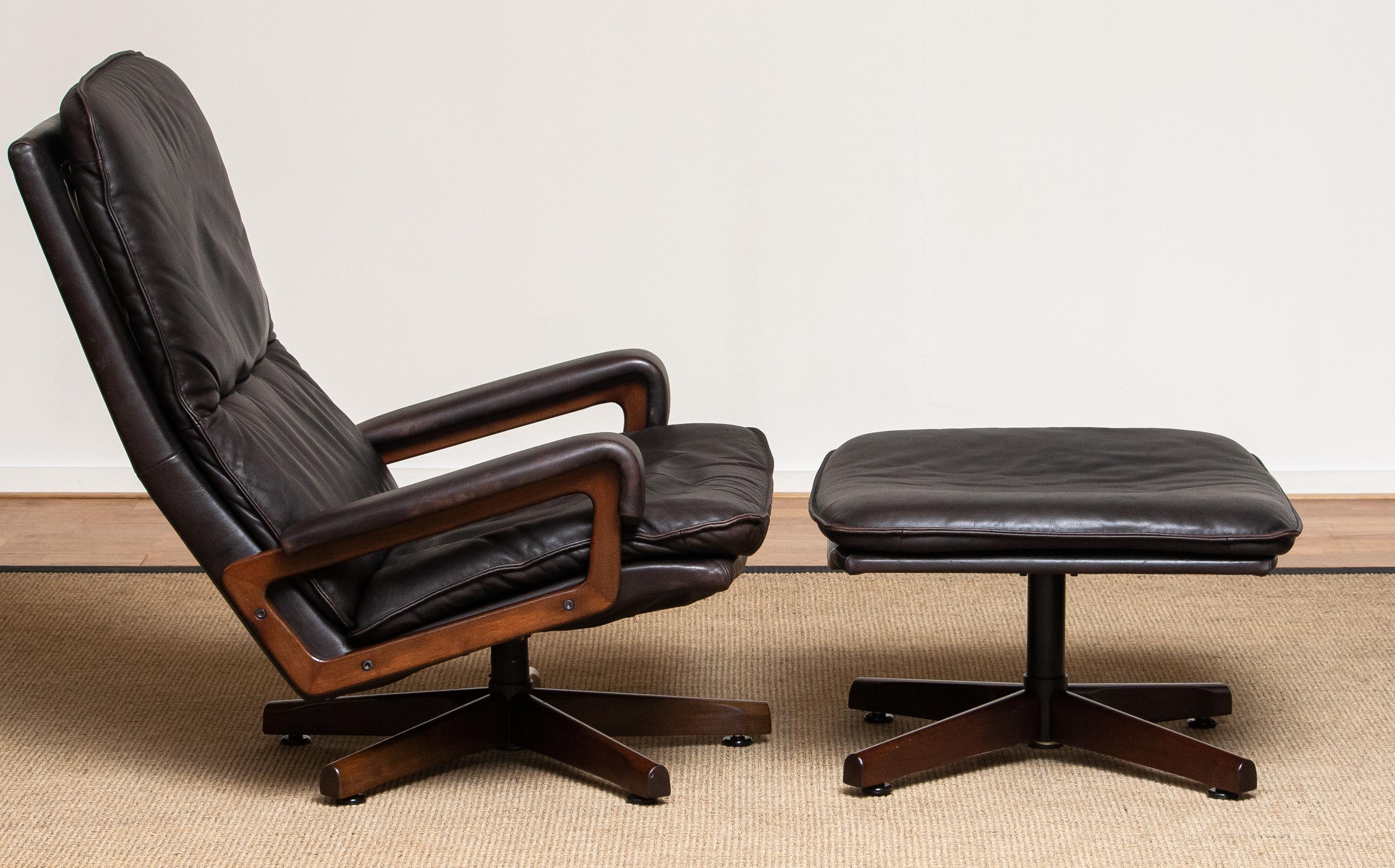 1970s Brown Leather Swivel Chair and Ottoman by André Vandenbeuck for WK Mobler 1