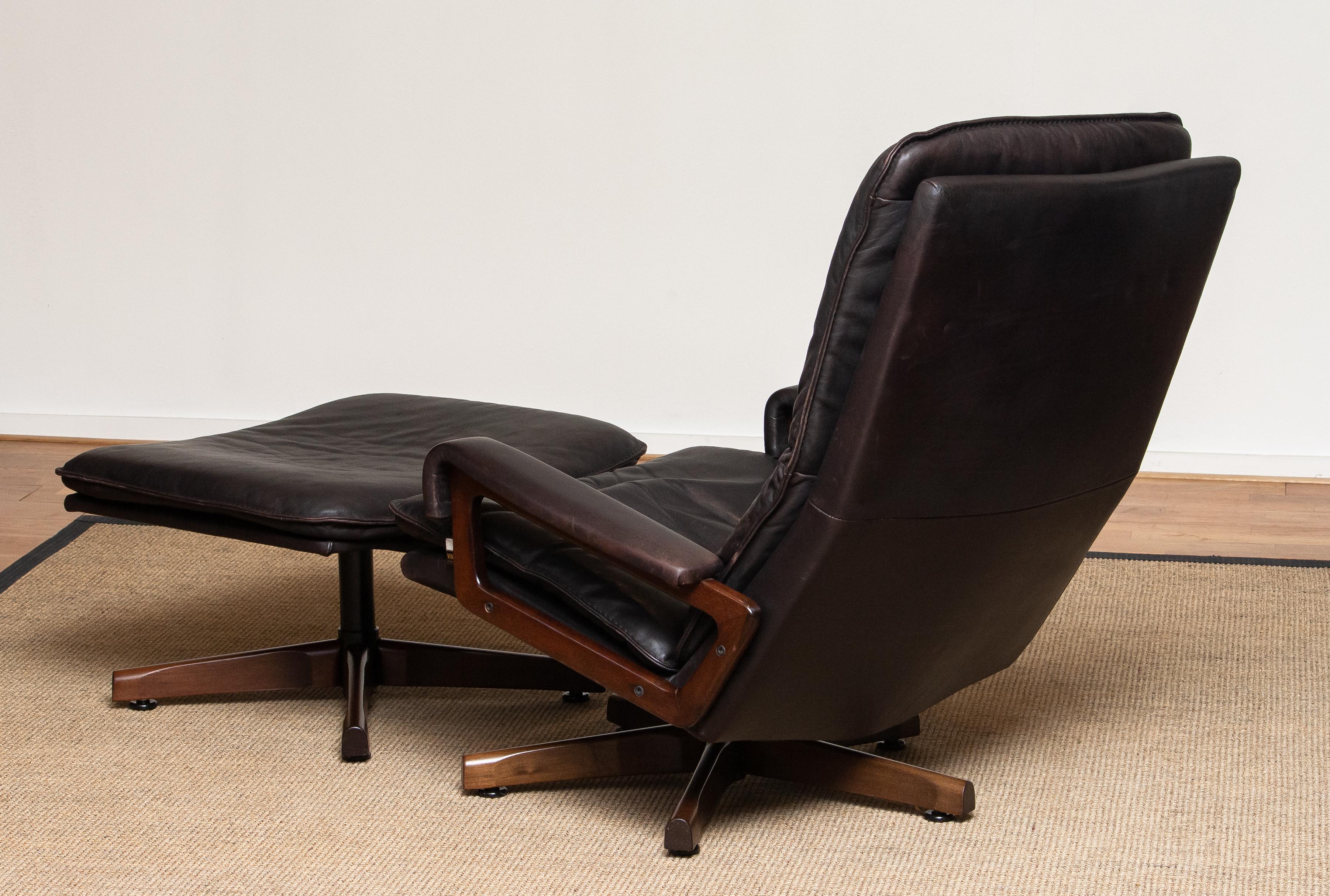 1970s Brown Leather Swivel Chair and Ottoman by André Vandenbeuck for WK Mobler 1