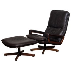 1970s Brown Leather Swivel Chair and Ottoman by André Vandenbeuck for WK Mobler