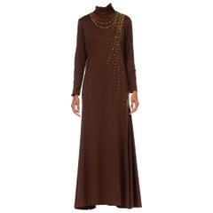 1970S Brown Polyester Jersey Gold Studded Ombré Long Sleeved Gown With Godets