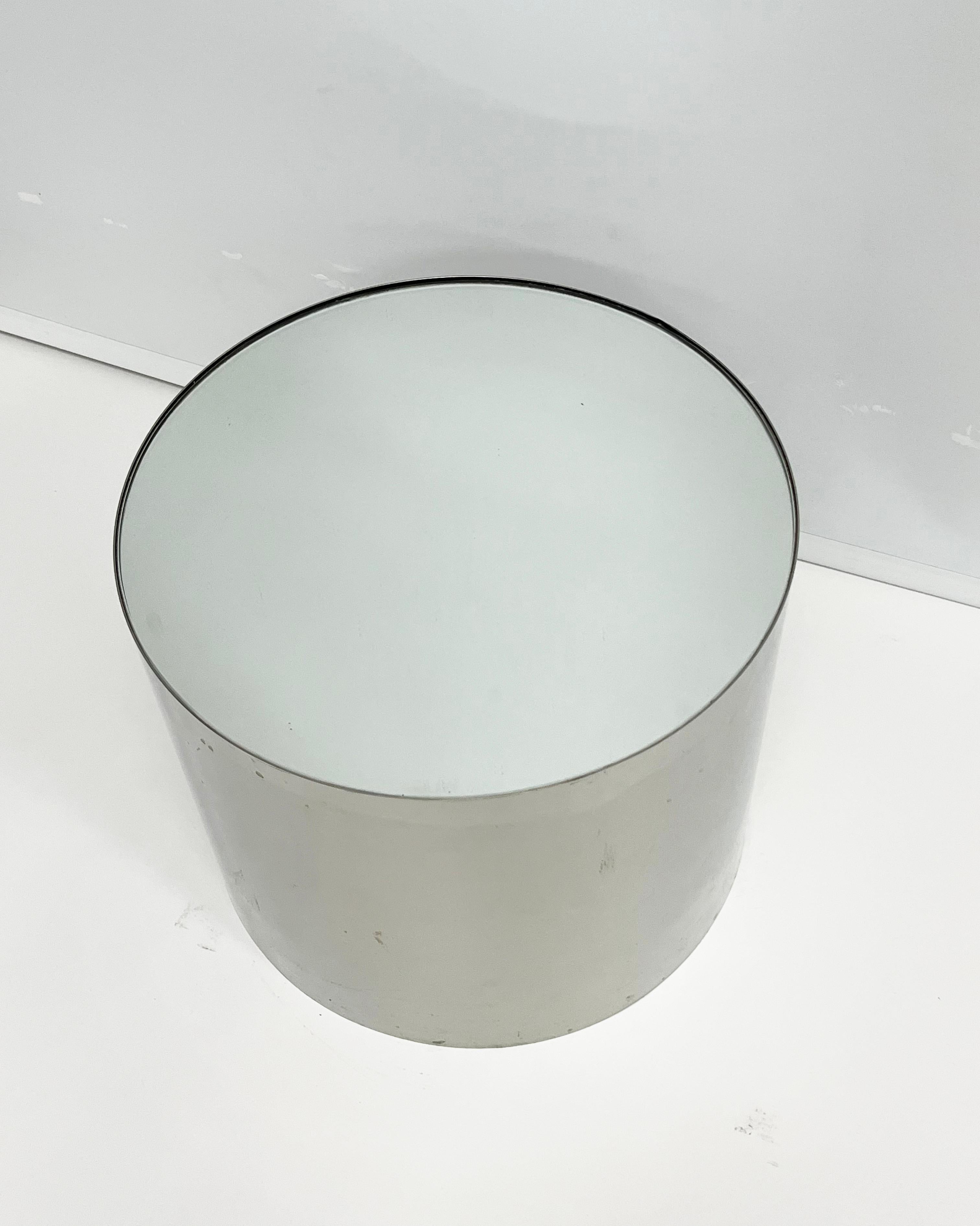 1970s Brueton style chrome and mirror top drum table.

18