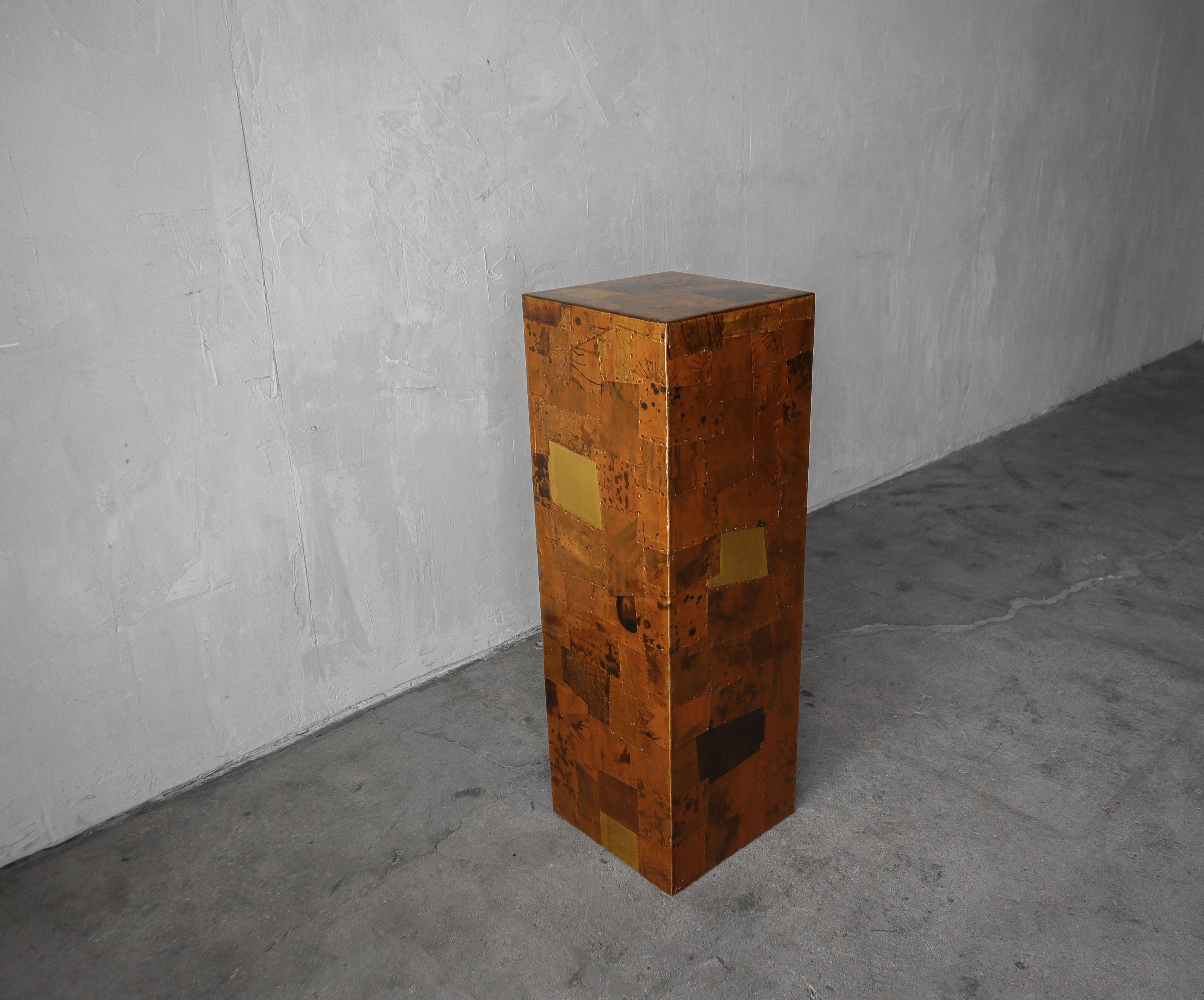 Great 1970s pedestal in lacquered patchwork copper by Brazilian furniture designer, Percival Lafer.

Pedestal is in great shape overall. The only imperfection to note is one small area of cracked lacquer at the base on one side. See last image.