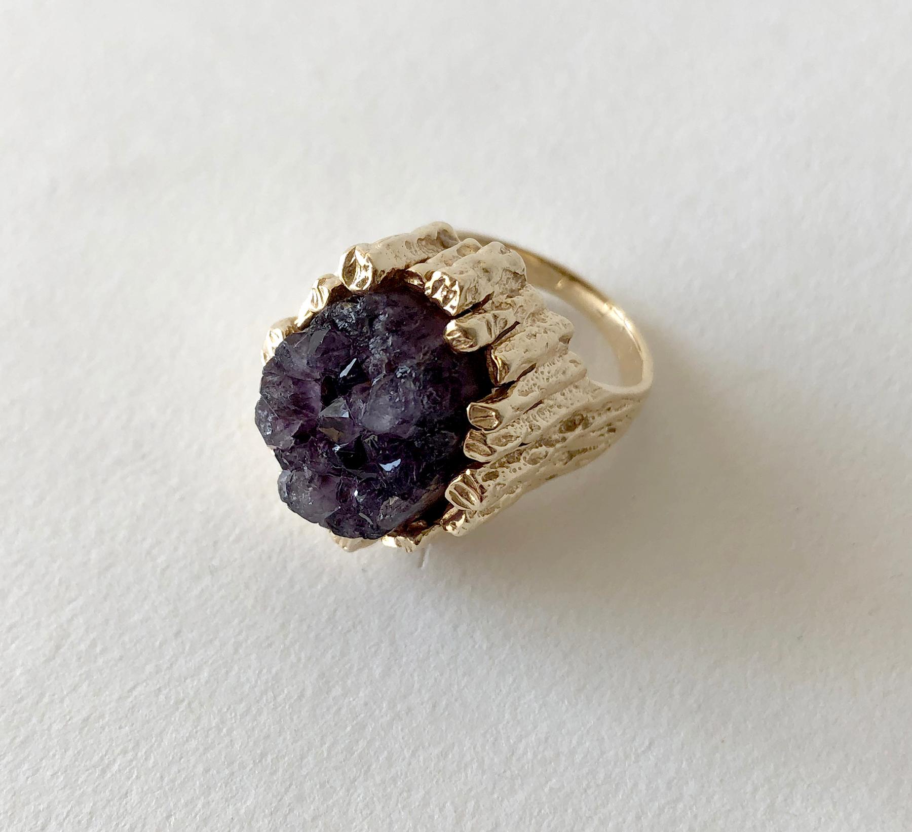 Brutalist 14K gold with dark amethyst druzy cocktail ring, circa 1970's.  Ring is a finger size 6 to 6.25 and is signed with an unknown hallmark on the interior shank.  Tests positive for 14K.  In very good vintage condition.  15.2 grams.