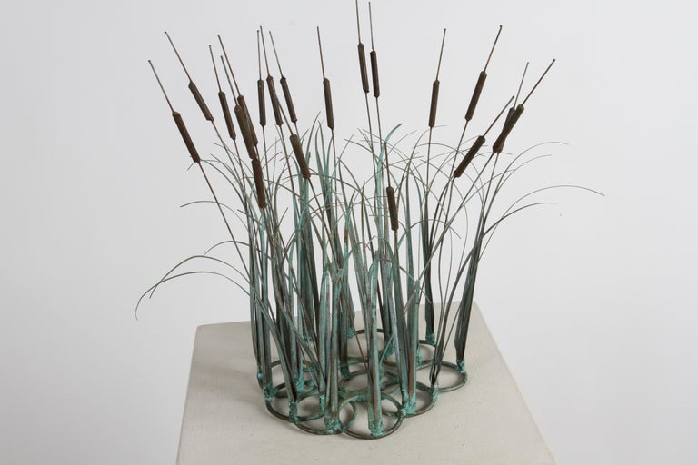 1970s Mid-Century Modern artisan made bronze and copper kinetic cattail and grasses sculpture with applied patina. Great sculpture for the coffee table, desk or as a centerpiece or more. In fine condition. 

In the style of C. Jeré. or Artisan