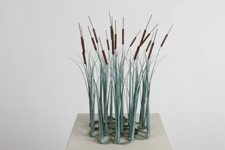 1970s Mid-Century Modern artisan made bronze and copper kinetic cattail, grasses with lily pads sculpture with applied patina. Great sculpture for the coffee table, desk or as a centerpiece or more. In fine condition. This is the last one, from a