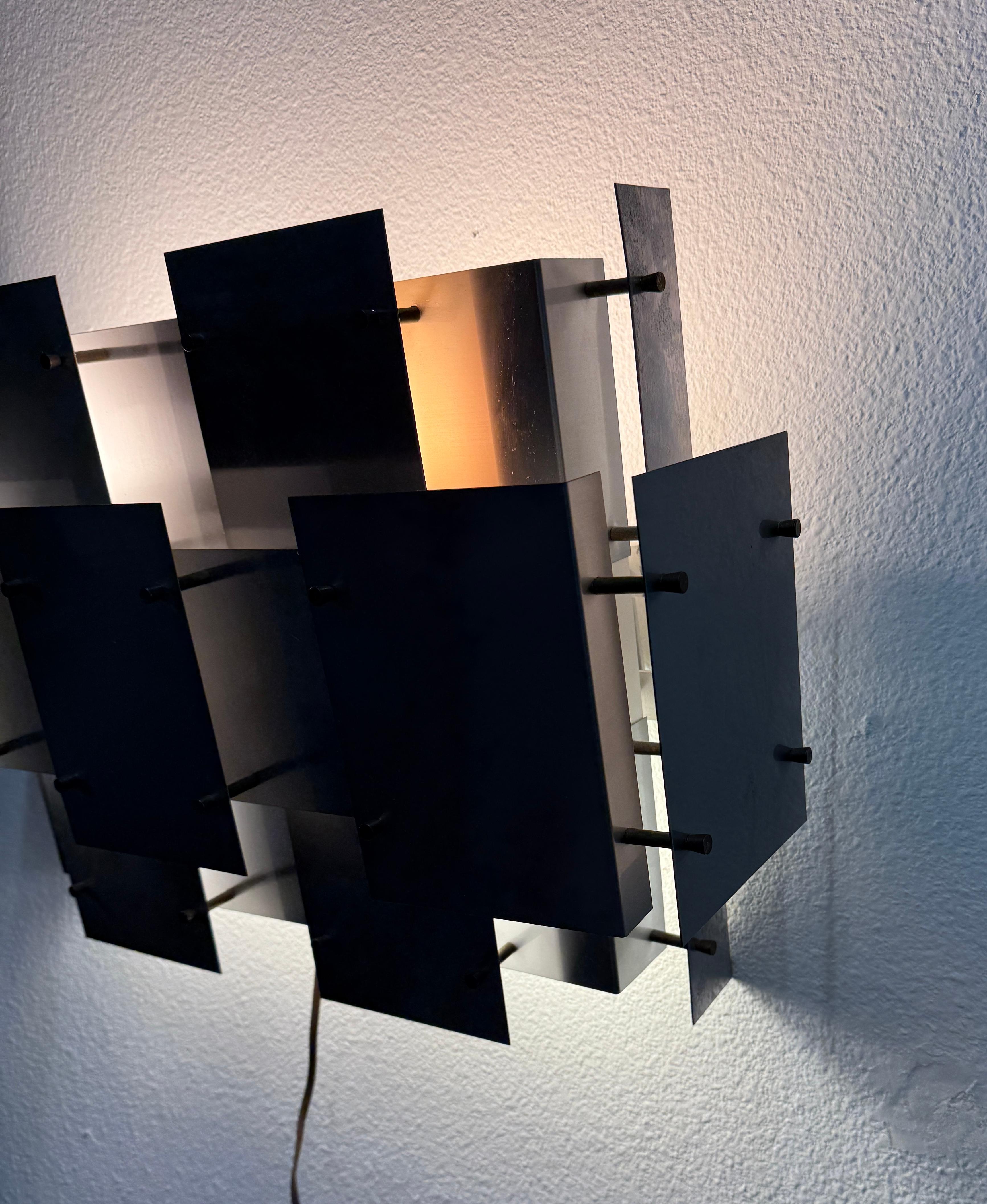 American 1970’s Brutalist Sonneman Cityscape Sconce For Sale