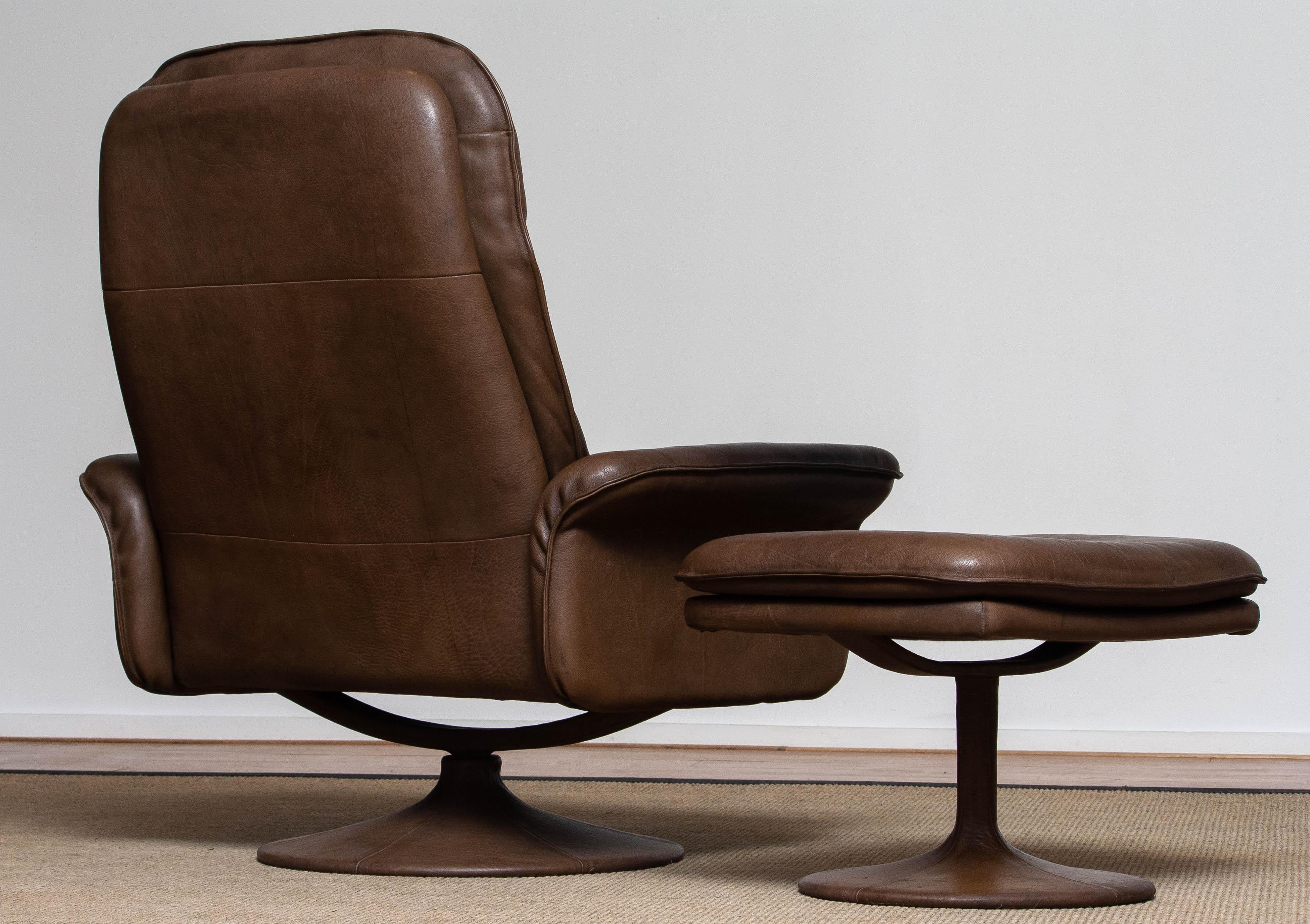 1970's Buffalo Leather Swivel and Relax Chair with Matching Ottoman by De Sede 2