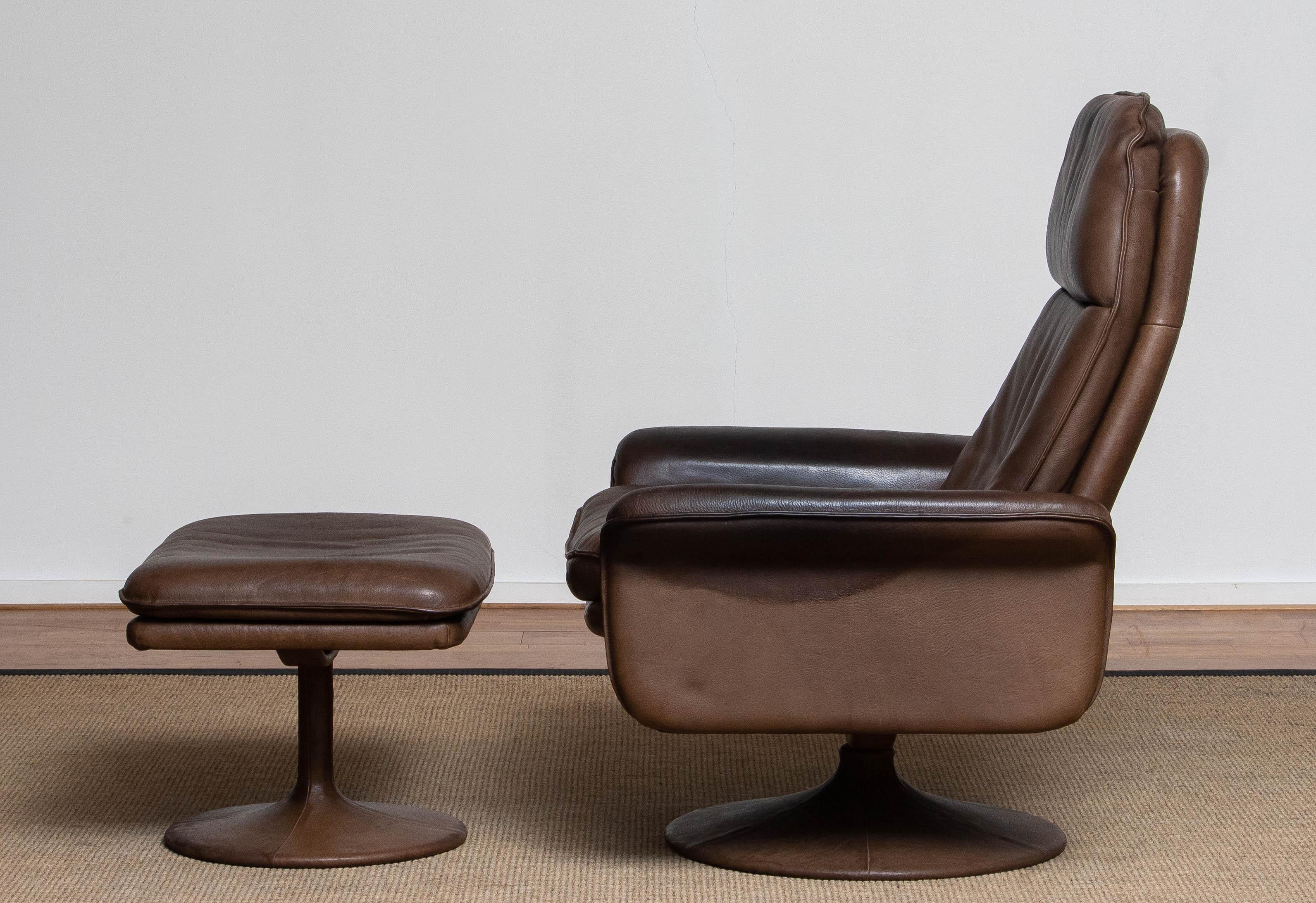 1970's Buffalo Leather Swivel and Relax Chair with Matching Ottoman by De Sede 3