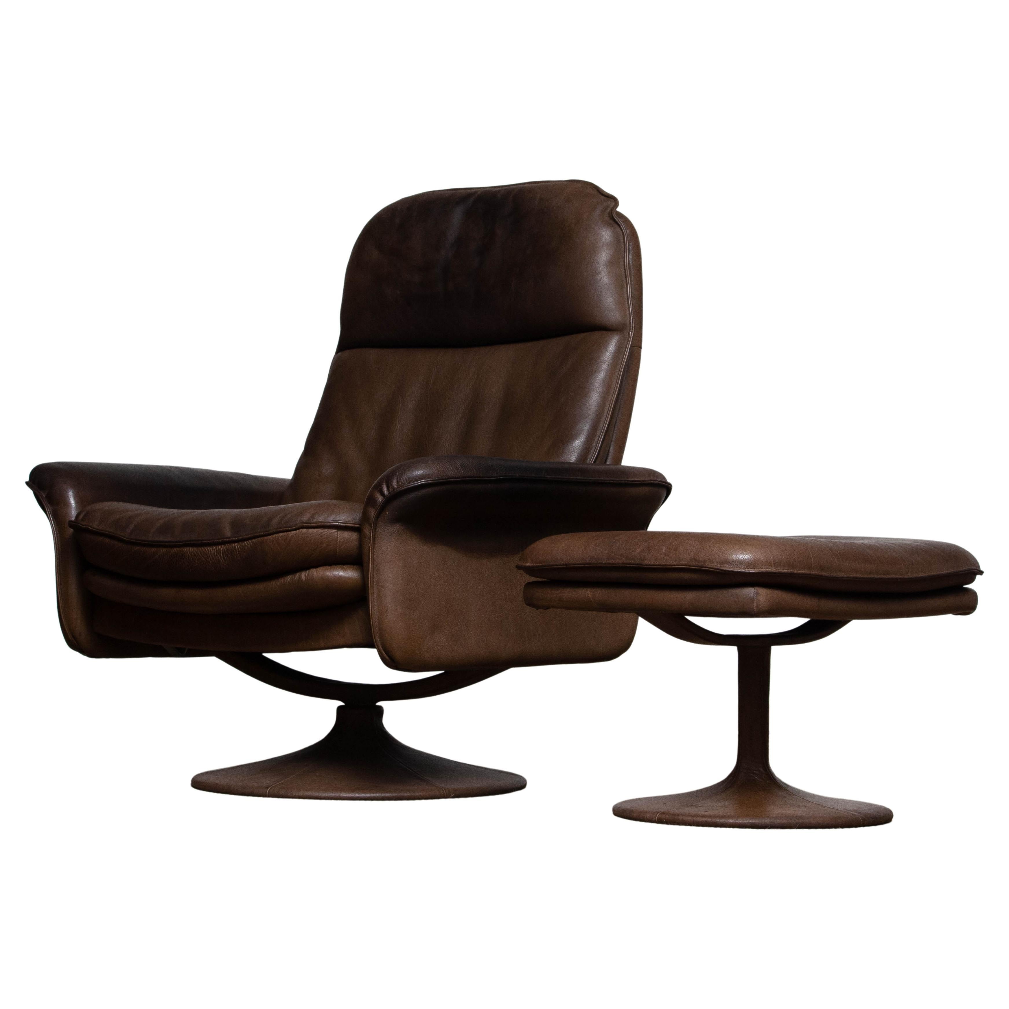 1970's Buffalo Leather Swivel and Relax Chair with Matching Ottoman by De Sede
