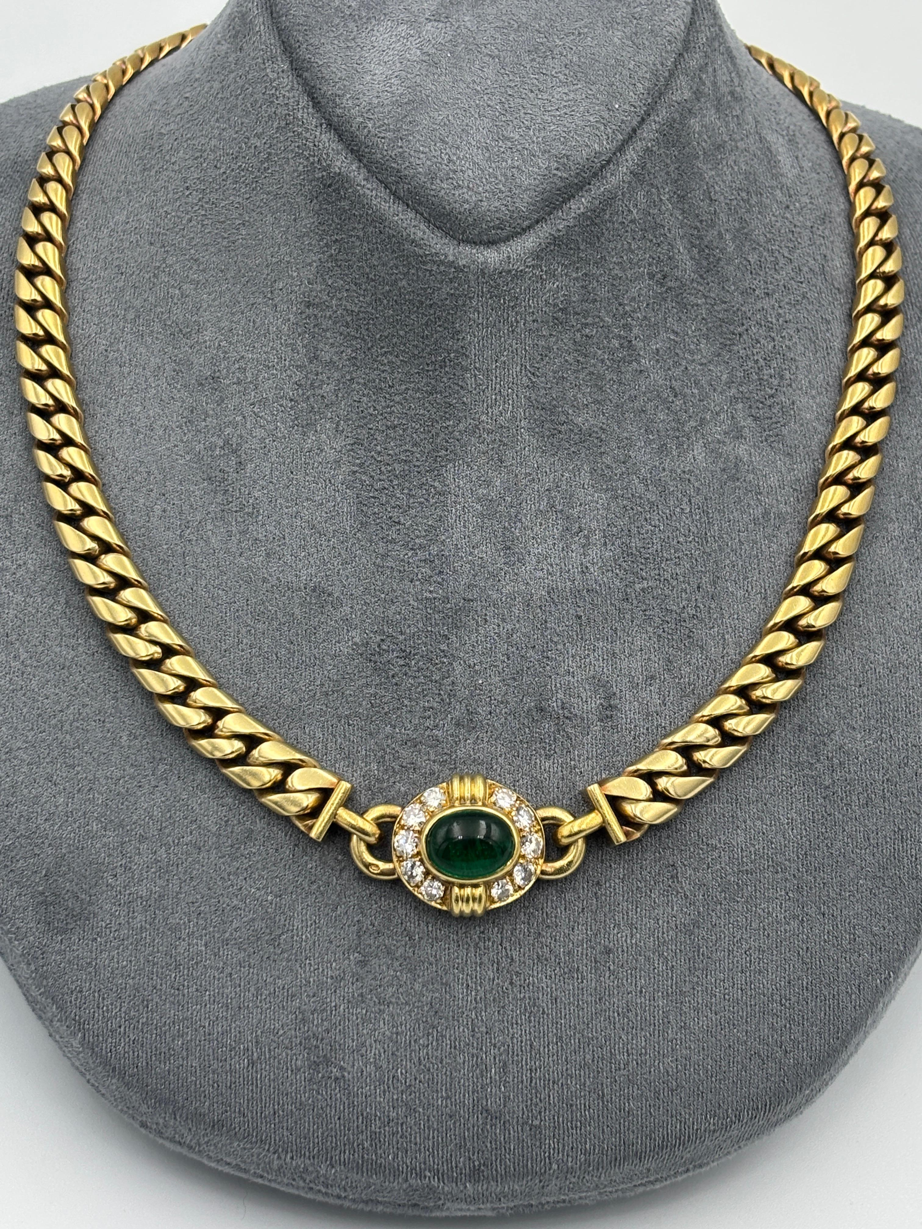 This beautiful vintage set from 1970s by Bulgari consists of an 18k gold chain choker and stud earrings. The necklace has a cabochon emerald that weighs approximately 3c and 0.75c diamonds. The earrings have a total of approximately 3.2 c emeralds