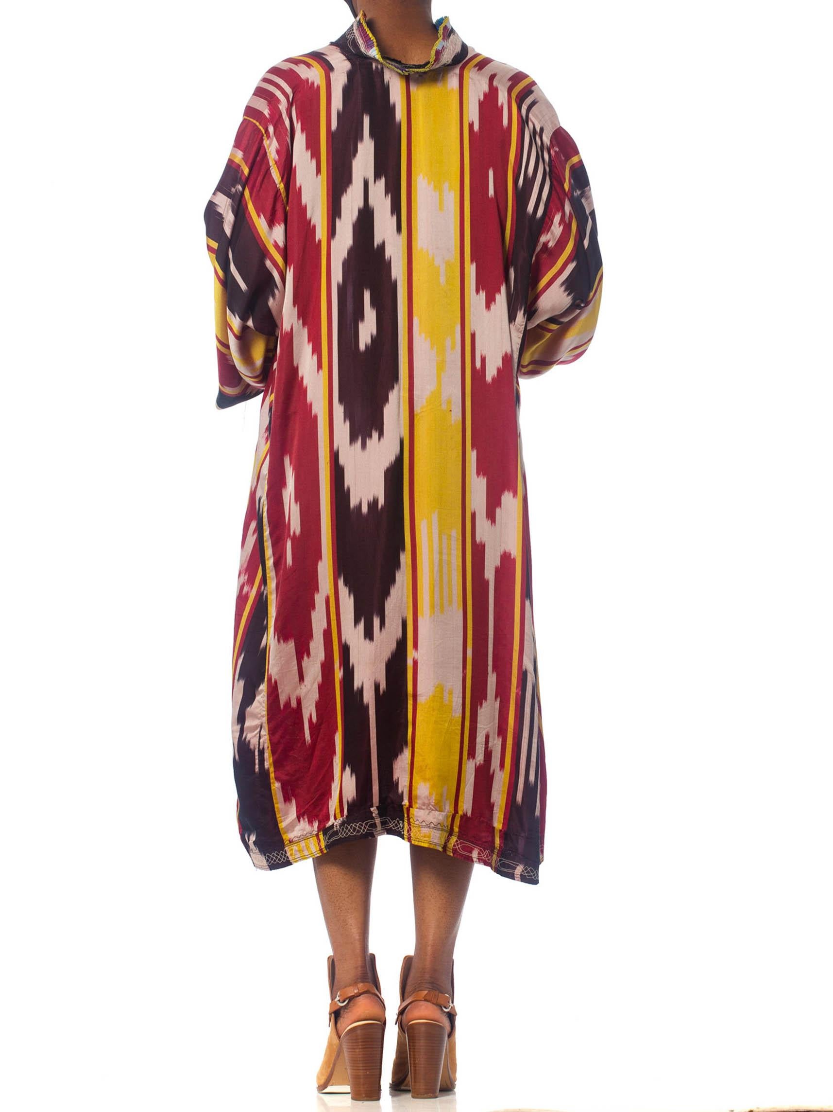 1970S Burgundy & Gold Silk Ikat Long Sleeve Unisex Kaftan With Pleated And Embr In Excellent Condition For Sale In New York, NY