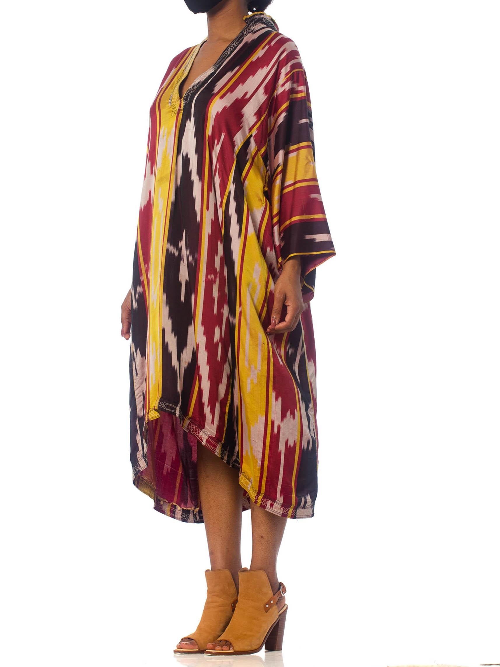 1970S Burgundy & Gold Silk Ikat Long Sleeve Unisex Kaftan With Pleated And Embr For Sale 1
