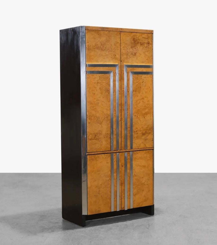 In style of Leon Rosen For Pace, this piece offers ample storage with multiple drawers on the inside.
