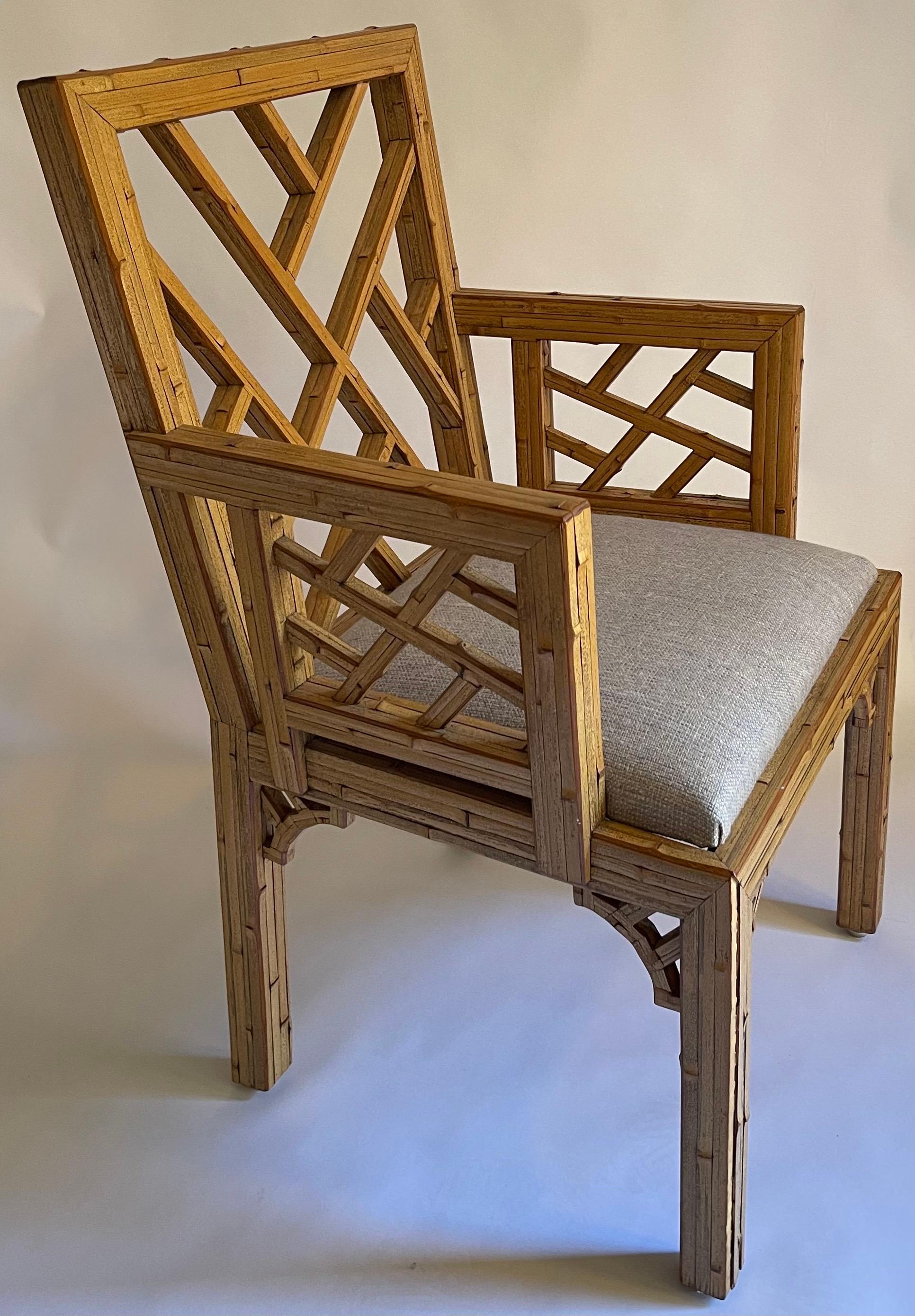 1970s burnt bamboo Chinese chippendale style armchair attributed to Harrison Van Horn. Chinese Chippendale wood chair with applied Burt bamboo reeds in a tessellated pattern. This chair is heavy and well made. 
Newly upholstered in Rogers & Goffigon
