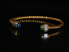 1970s Bvlgari emerald, sapphire and diamond 18k Yellow Gold "slave" bracelet