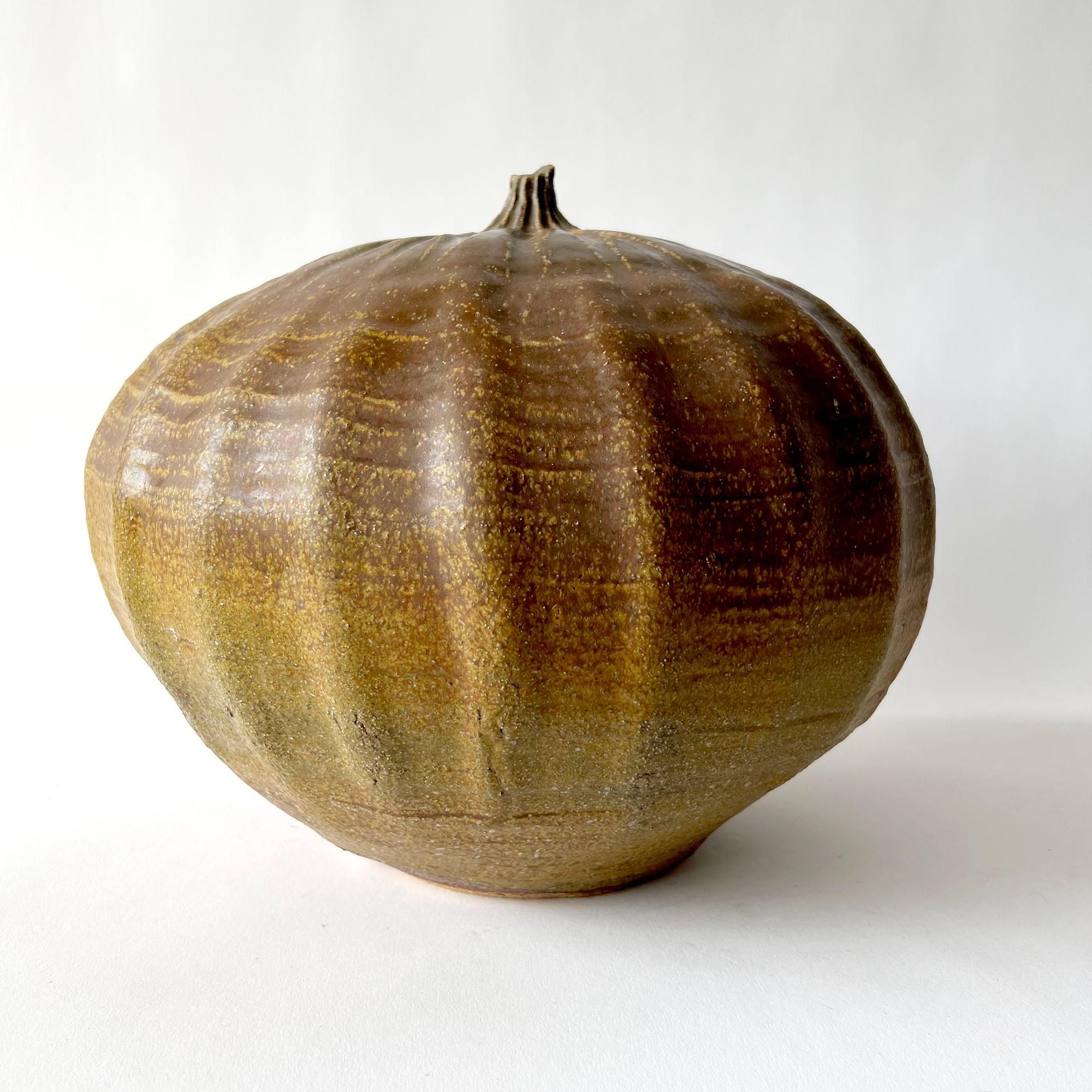 Handmade California studio gourd or pumpkin sculpture vase. Piece measures 12