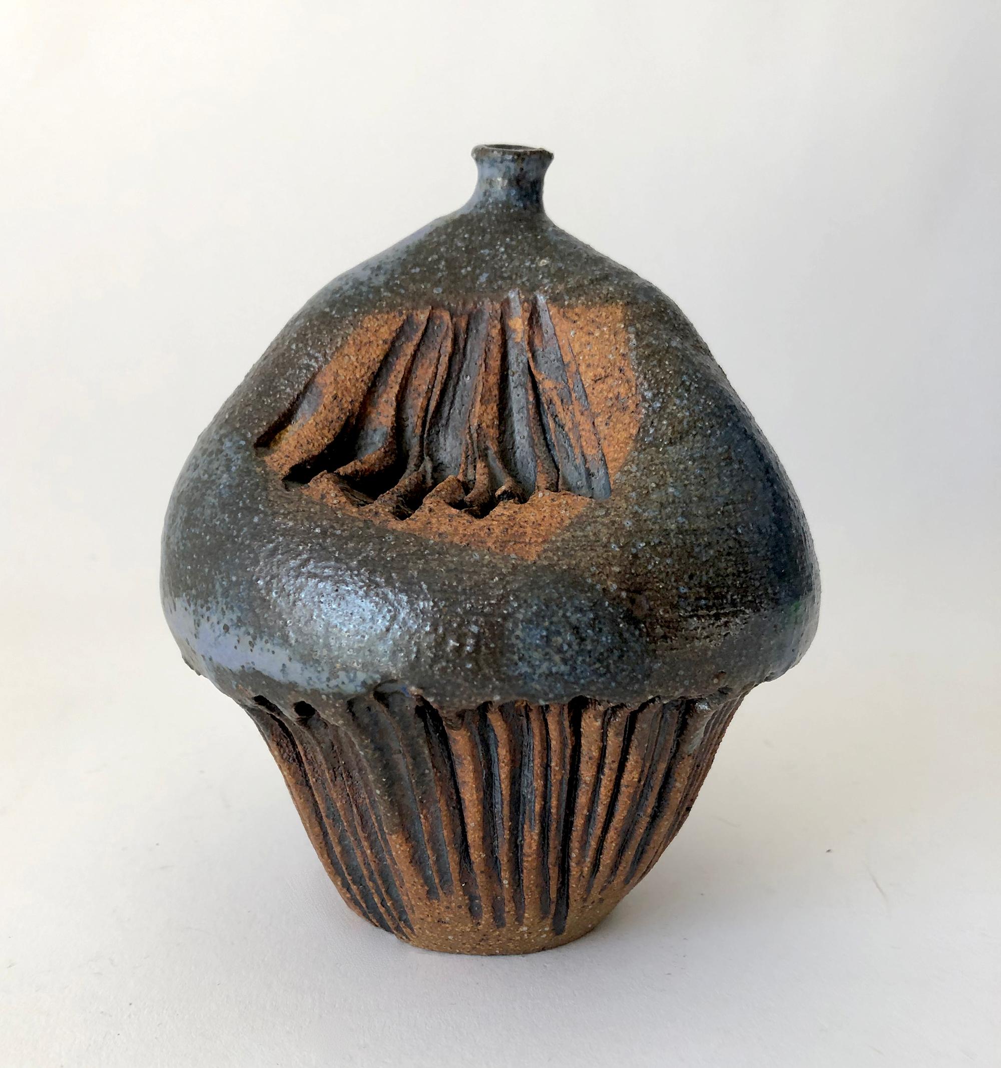 California studio pottery pinched weed vase with bold sgrafitto texture. Vase measures 5.5' by 4.5