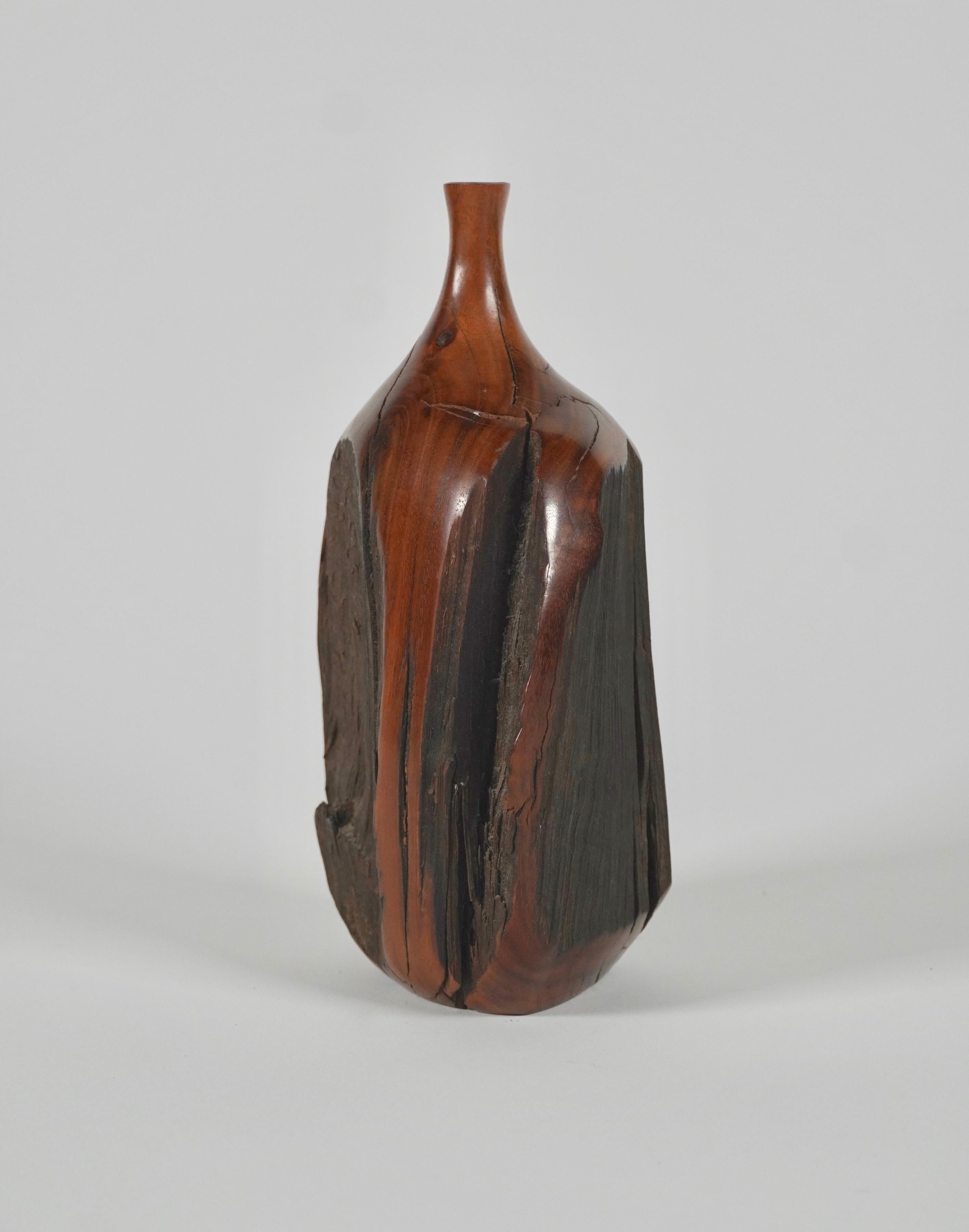 Circa 1970s Mendocino studio Craft woodworker Doug Ayers handcrafted wooden vase / weed pot, this is a live edge example created out of black walnut having rich reddish hues to the piece, signed and dated, D. Ayers, Black Walnut, 9-74.