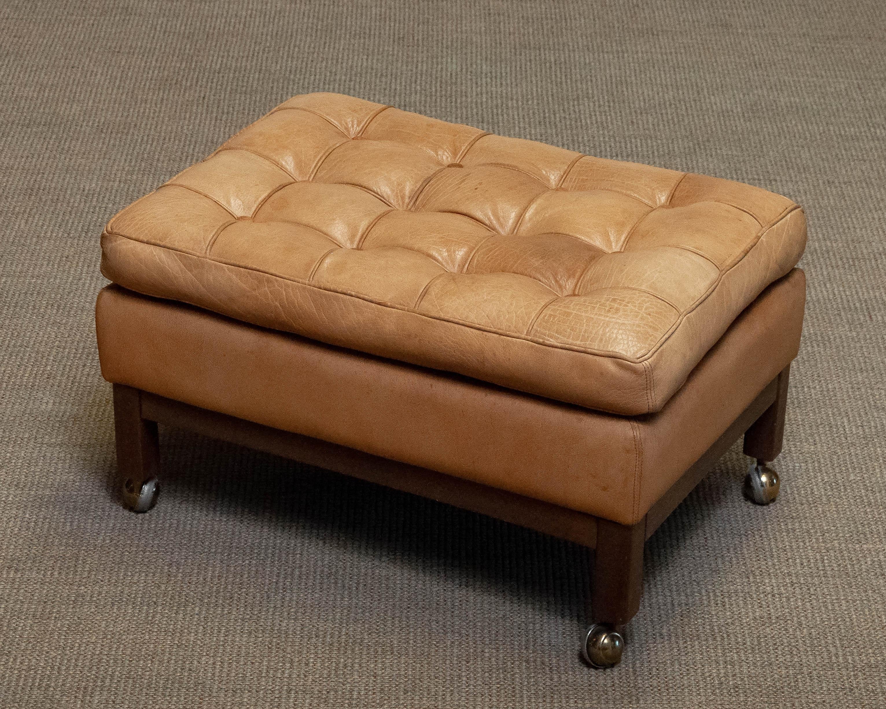1970s Camel / Brown Colored Leather Ottoman Model 'Merkur' by Arne Norell In Good Condition For Sale In Silvolde, Gelderland
