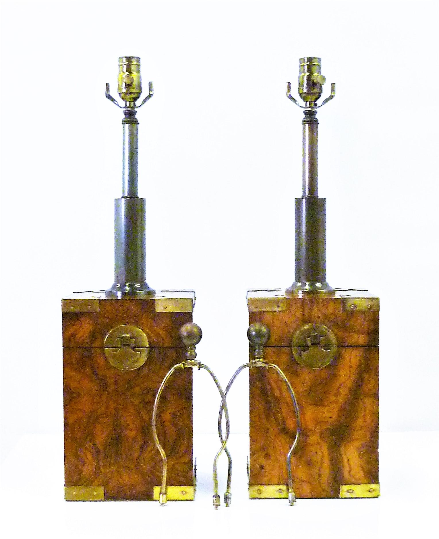 REDUCED FROM $1,100.....Beautiful burl woods and brass campaign style mounts highlight this pair of table lamps. Depicting antique tea boxes, they were produced by Knob Creek of Morgantown in the 1970s. Rewired and with new UL antique brass three