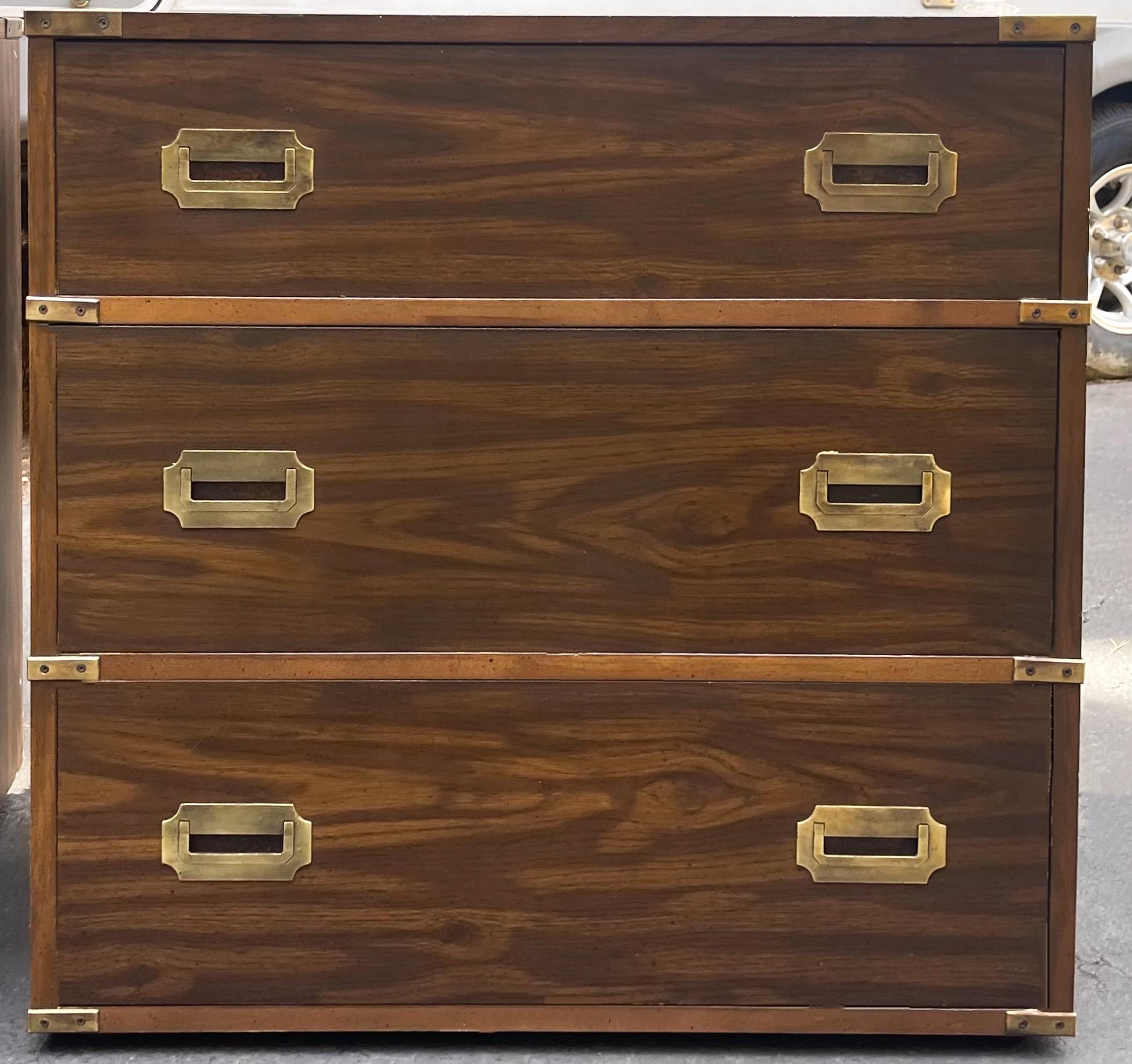 This is a pair of campaign style chests / commodes attributed to Henredon. They are not marked and do have dovetail construction. The hardware is original. The wood has an oak finish. The chests have small bun feet.

My shipping is for the