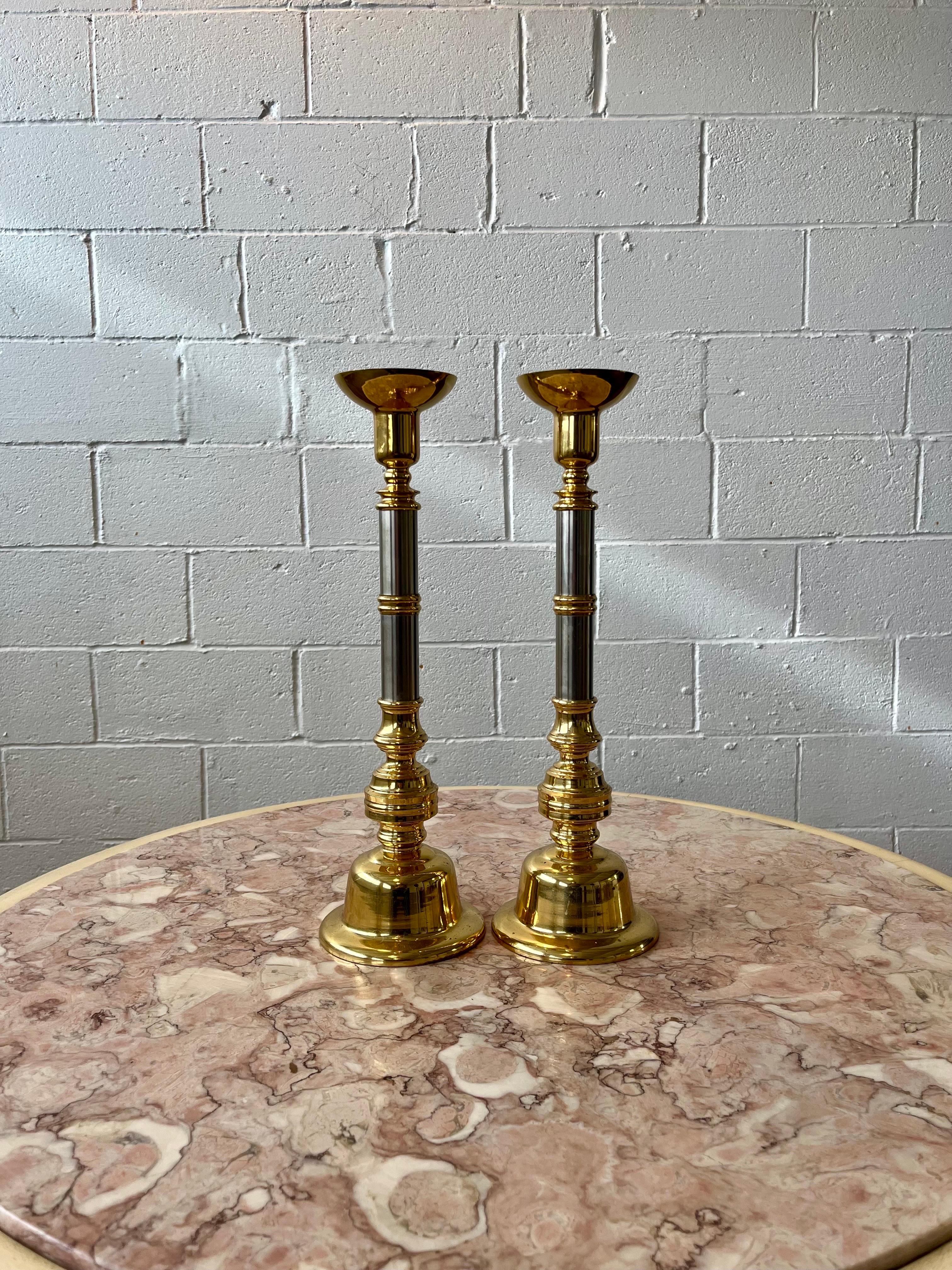Beautiful mixed metal candlesticks. Chrome and brass design for classic to modern decor.  Heavy weight. 