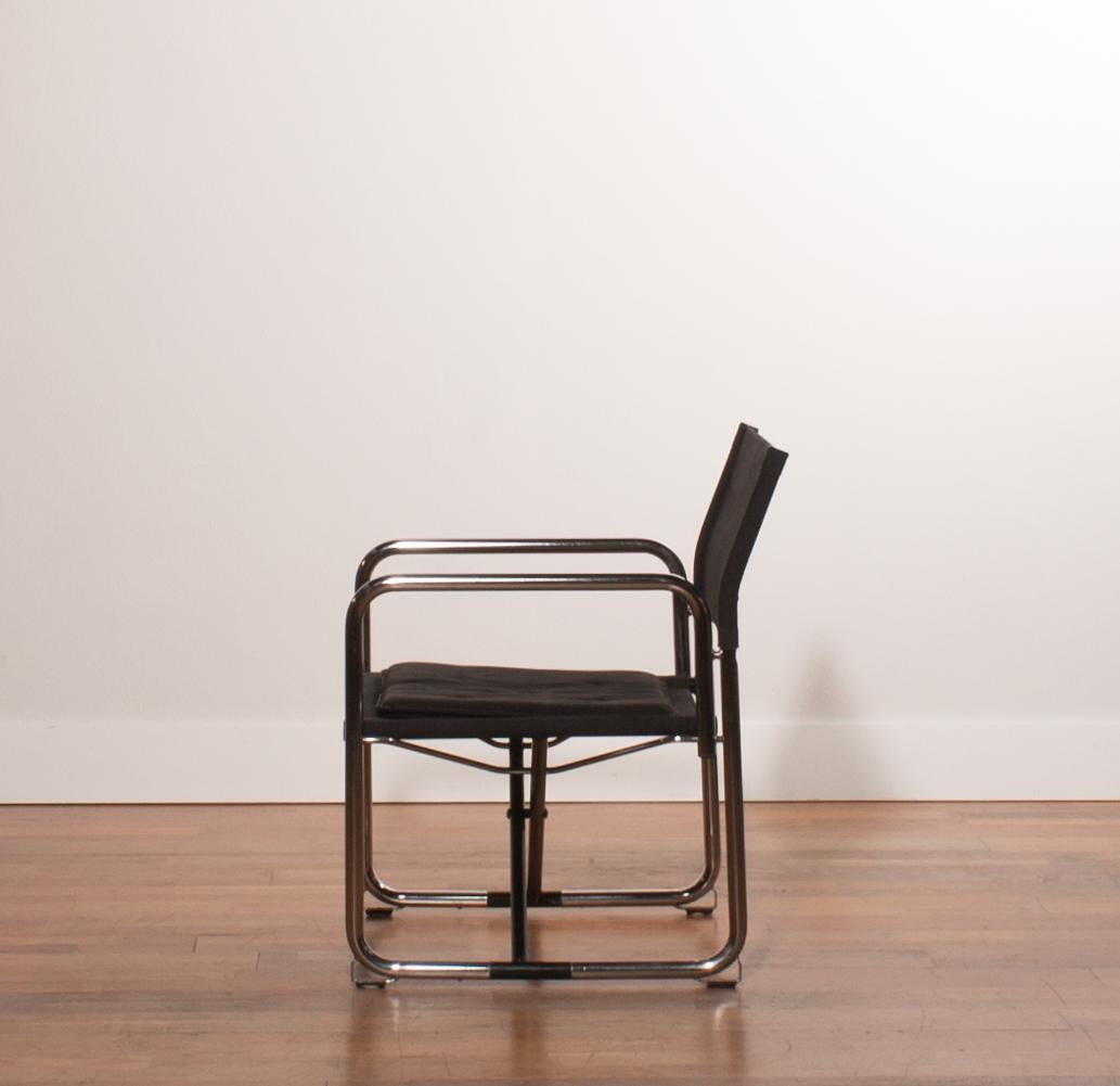 A beautiful folding chair or armchair designed by Börge Lindau &
Bo Lindecrantz for Lammhults, Sweden.
The black canvas seat and back in combination
with the chromed frame chair has a nice sturdy appearance.
The chair is very sturdy and
