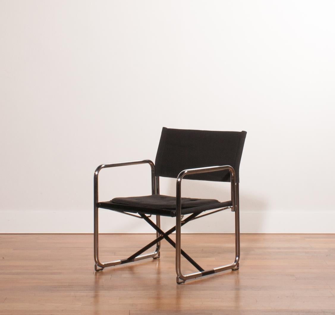 A beautiful folding chair or armchair designed by Börge Lindau &
Bo Lindecrantz for Lammhults, Sweden.
The black canvas seat and back in combination
with the chromed frame chair has a nice sturdy appearance.
The chair is very sturdy and