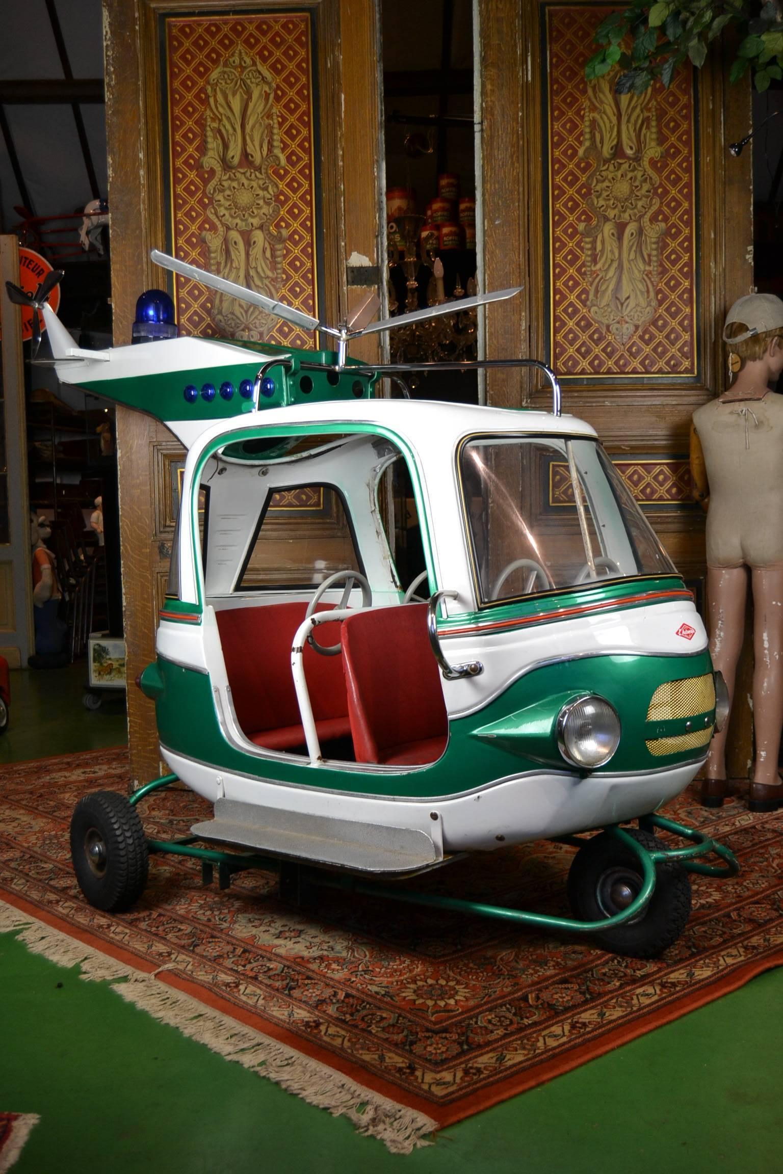 Exceptional piece of Carnival Art theme aviation - aeronautics. 
Big handmade metal police helicopter made by the famous Belgium Fairground Atelier L' Autopede in the Seventies.
This spectacular child's Heli - aircraft - chopper - Whirlybird in