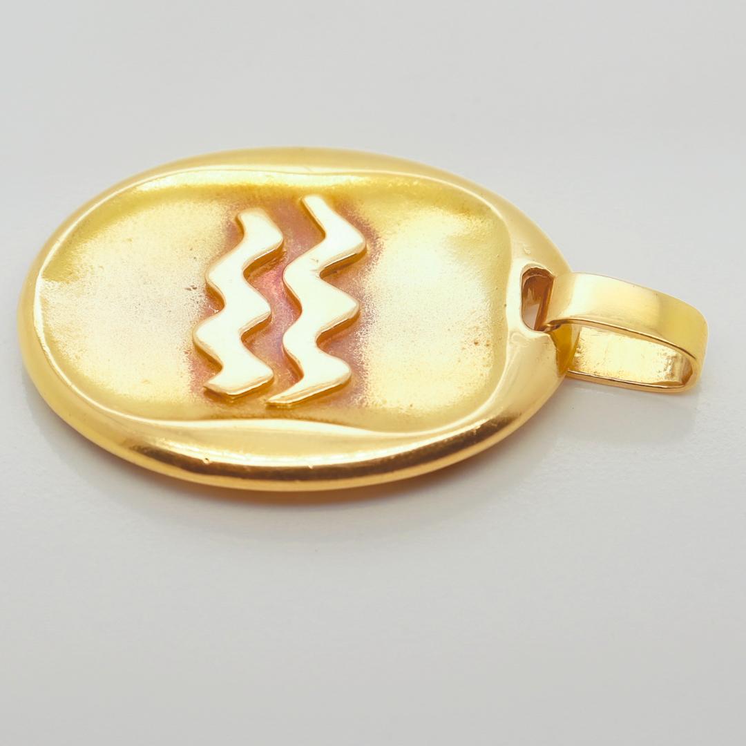 1970's Cartier 18k Gold Aquarius Zodiac Pendant by Georges L'Enfant  11