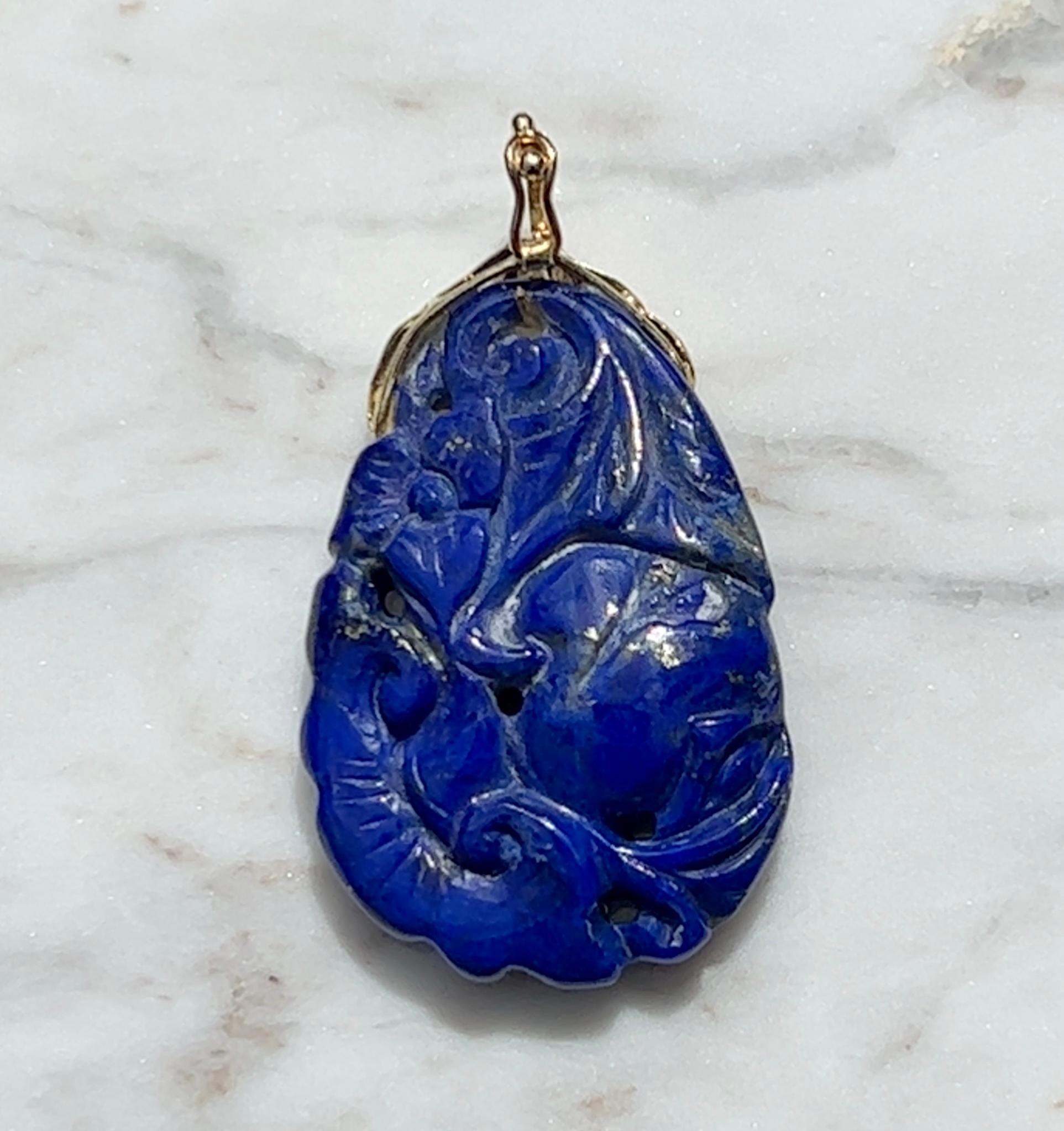 1970s Carved Lapis Lazuli Pendant with 14 Karat Gold Enhancer Bail In Good Condition In Towson, MD