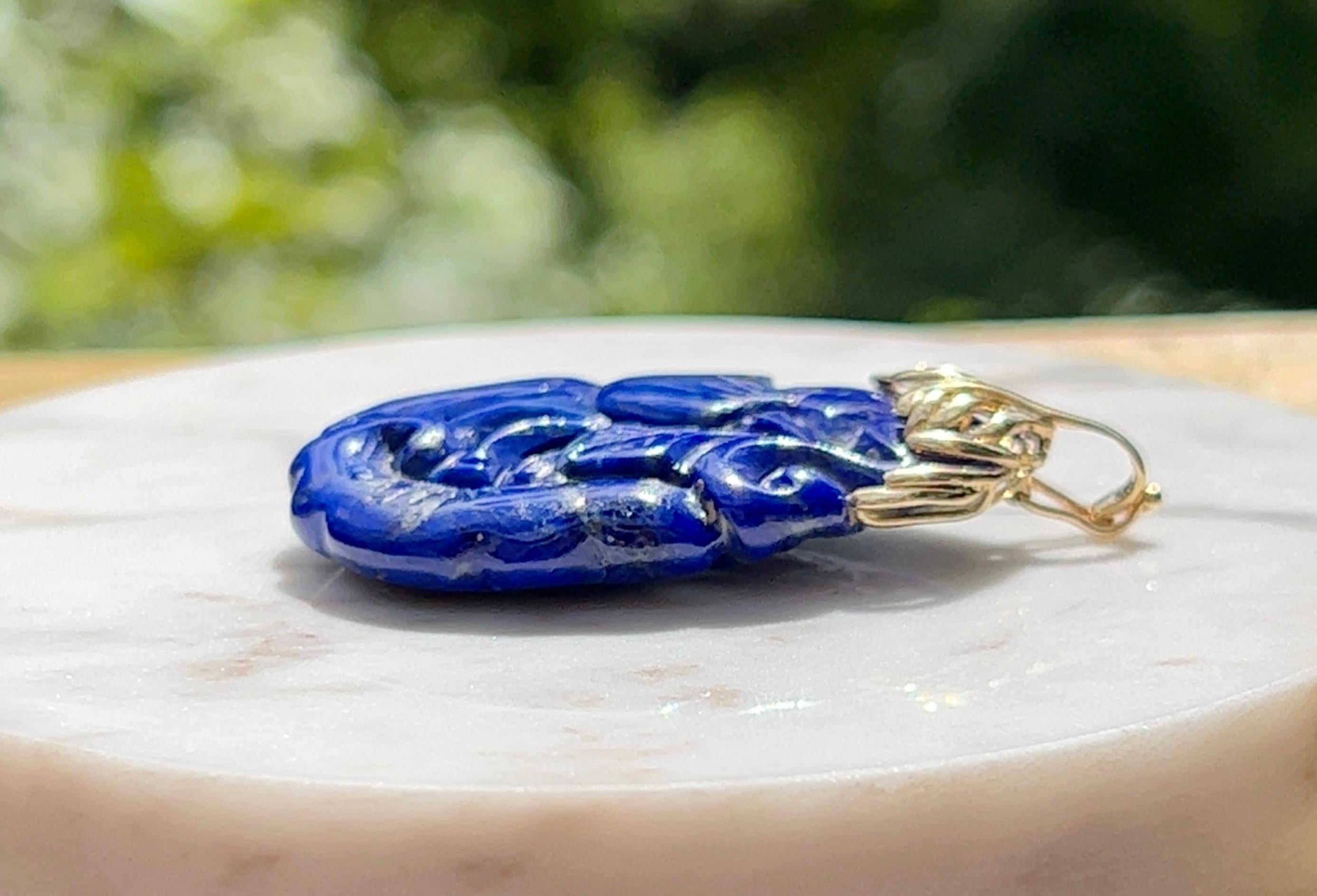 Women's or Men's 1970s Carved Lapis Lazuli Pendant with 14 Karat Gold Enhancer Bail