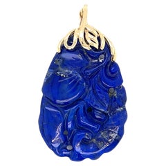 1970s Carved Lapis Lazuli Pendant with 14 Karat Gold Enhancer Bail