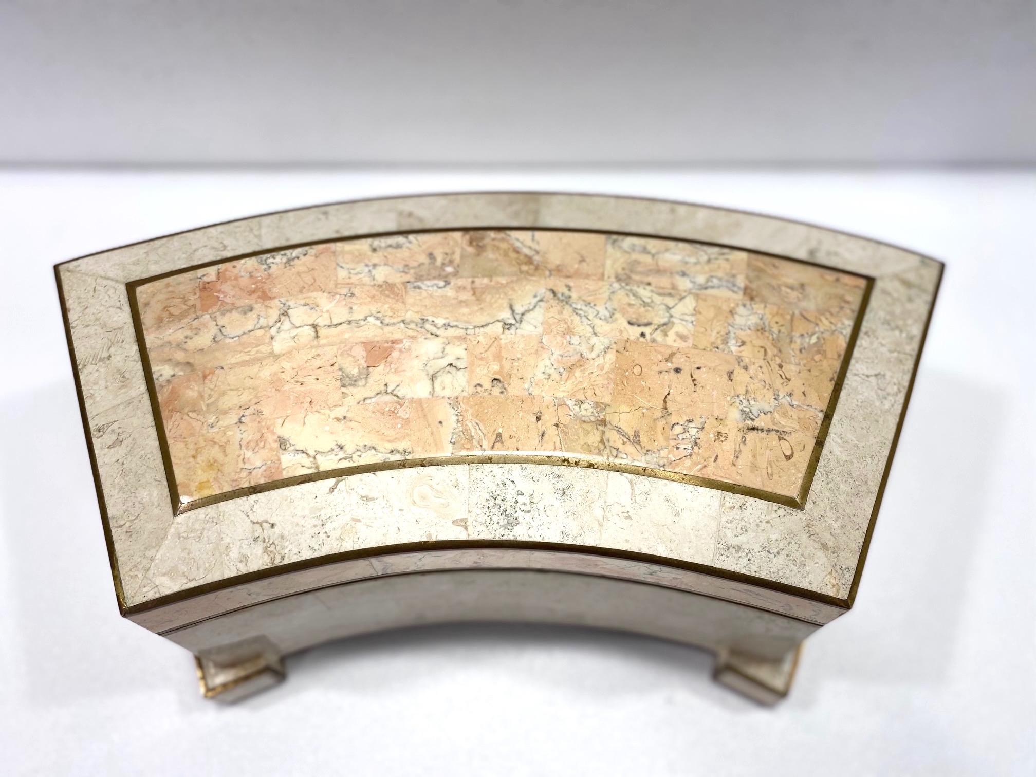 Mid-Century Modern large tessellated marble and stone jewelry box. The footed box features a plinth architectural curved frame with brass metal inlays and trim accent along all edges. Removable lid opens to a luxe felt interior in chocolate brown.