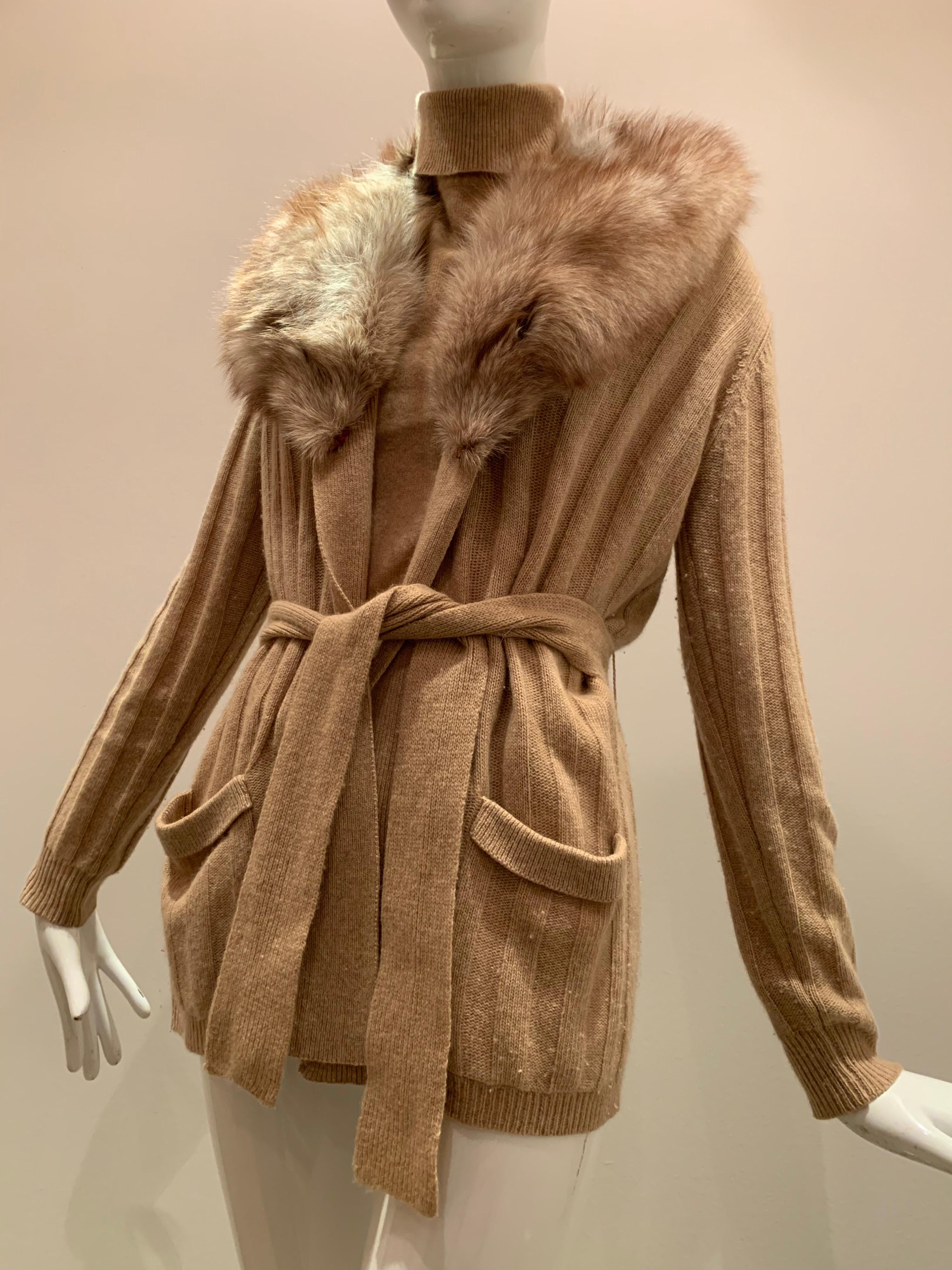 A gorgeous 1970s rib knit camel-color cashmere twinset from Furvere:  The sleeveless shell had a turtleneck and fitted waist.  The cardigan has roomy patch pockets, original belt and luxurious fox fur collar.  